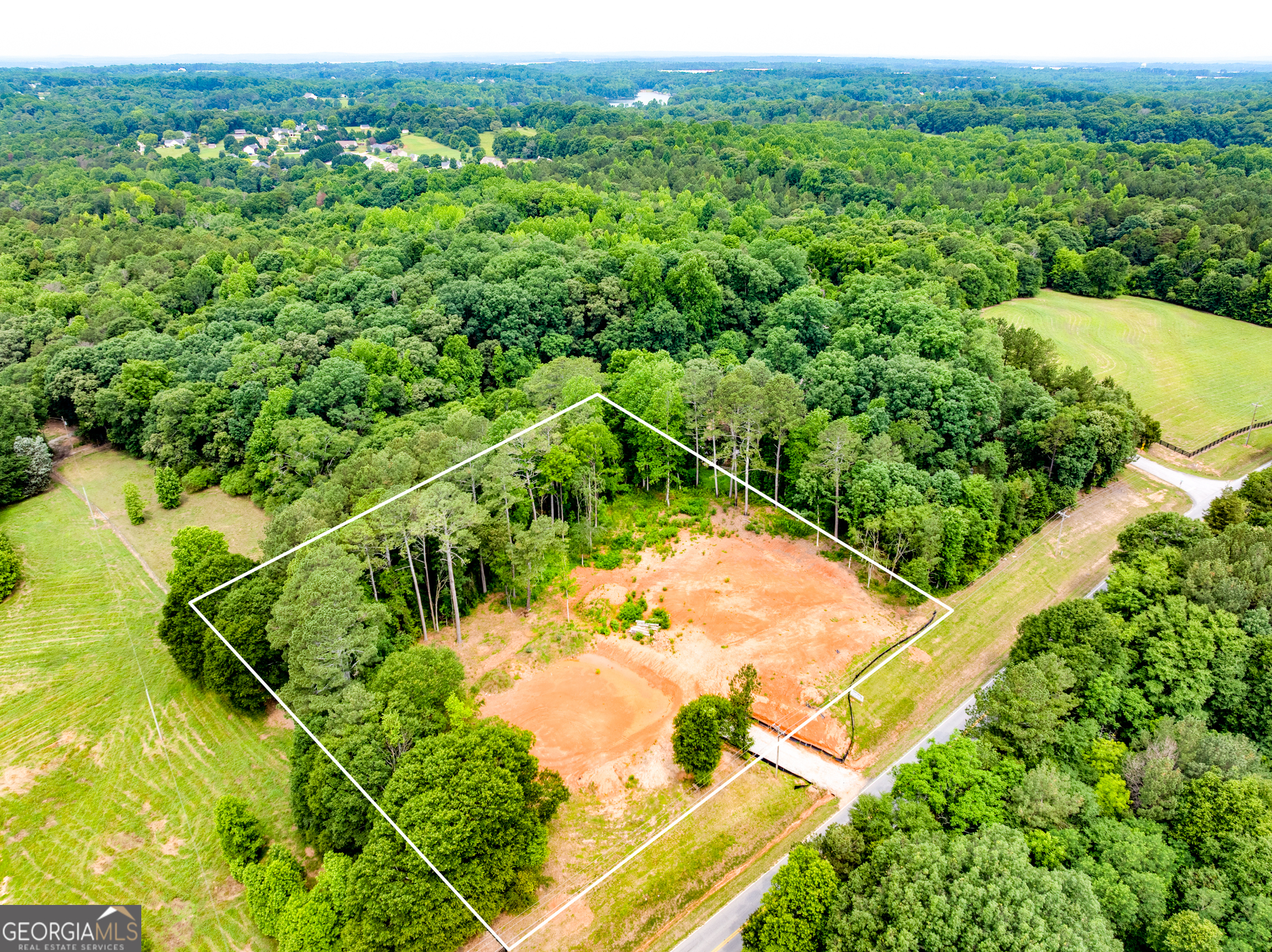 2.89 Acre lot. Ready for your dream home! This property can also be split into two lots. Water meters are set for each lot and all soil test are complete along with driveway approval. Only minutes from Downtown Jefferson.
