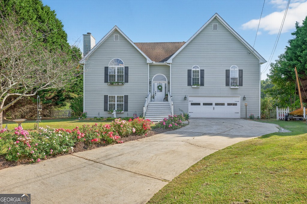 Well maintained Grayson 4BR/3BA split-level, Extensive landscaping on nearly 1-acre cul-de-sac level lot! Charming lower-level in-law suite. Many updates, recent upgrades: new bathroom vanities, new concrete siding, energy-efficient windows, new garage & exterior doors, Trex sundeck/entry flooring, updated lighting, LVP & tile floors. Fireplace in living room, separate dining, and eat-in kitchen with stainless steel appliances. Bonus room in Lower Level could be home office with separate entrance or extra bedroom Security cameras, generator & Robo mower included. Great family-friendly neighborhood, close to shopping, dining & parks move-in ready!