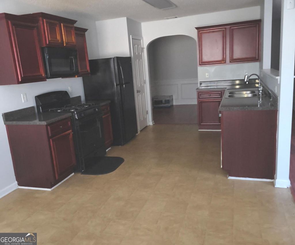 Photo of 1821 Roble Drive, Atlanta, GA 30349 (MLS # 10703483)