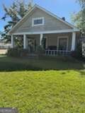 Photo of 602 W Jessamine Street, Fitzgerald, GA 31750 (MLS # 10880421)