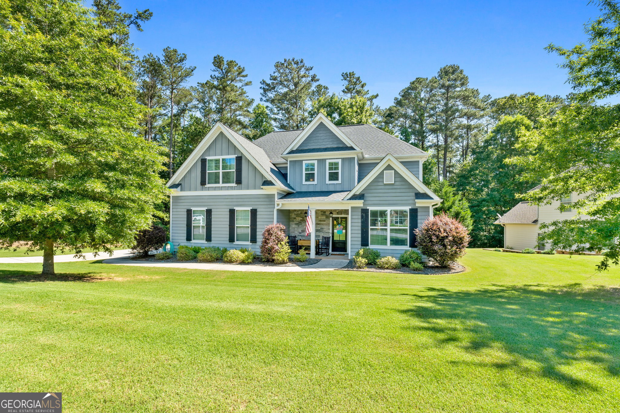 Lovely 4 bedroom, 2 1/2 bath craftsman style home built in 2016 convenient to Trilith, Fayetteville, and Peachtree City. For those looking for a well-maintained property, this is a one owner, pet free home which has been professionally cleaned twice a month. Main level includes office/living room, separate dining room, family room, powder room, and beautifully appointed kitchen w/ the latest in design, including granite and stainless steel appliances with gas range. Hardwoods in the foyer, powder room, dining room and kitchen. Second level offers a spacious owner's suite with a lovely bath with a tiled shower, separate soaking tub, double vanity, and a spacious walk in closet. Second level also includes three additional bedrooms, full bath, and the laundry room is located adjacent to the owner's suite for added convenience. Elegant lighting and upgrades throughout the home. The covered porch looks out over the private sodded backyard with a natural wooded buffer. The neighborhood amenities include pool, tennis, pickleball, basketball, playground and a walking path which connects to the public paths to the nearby schools and surrounding area.