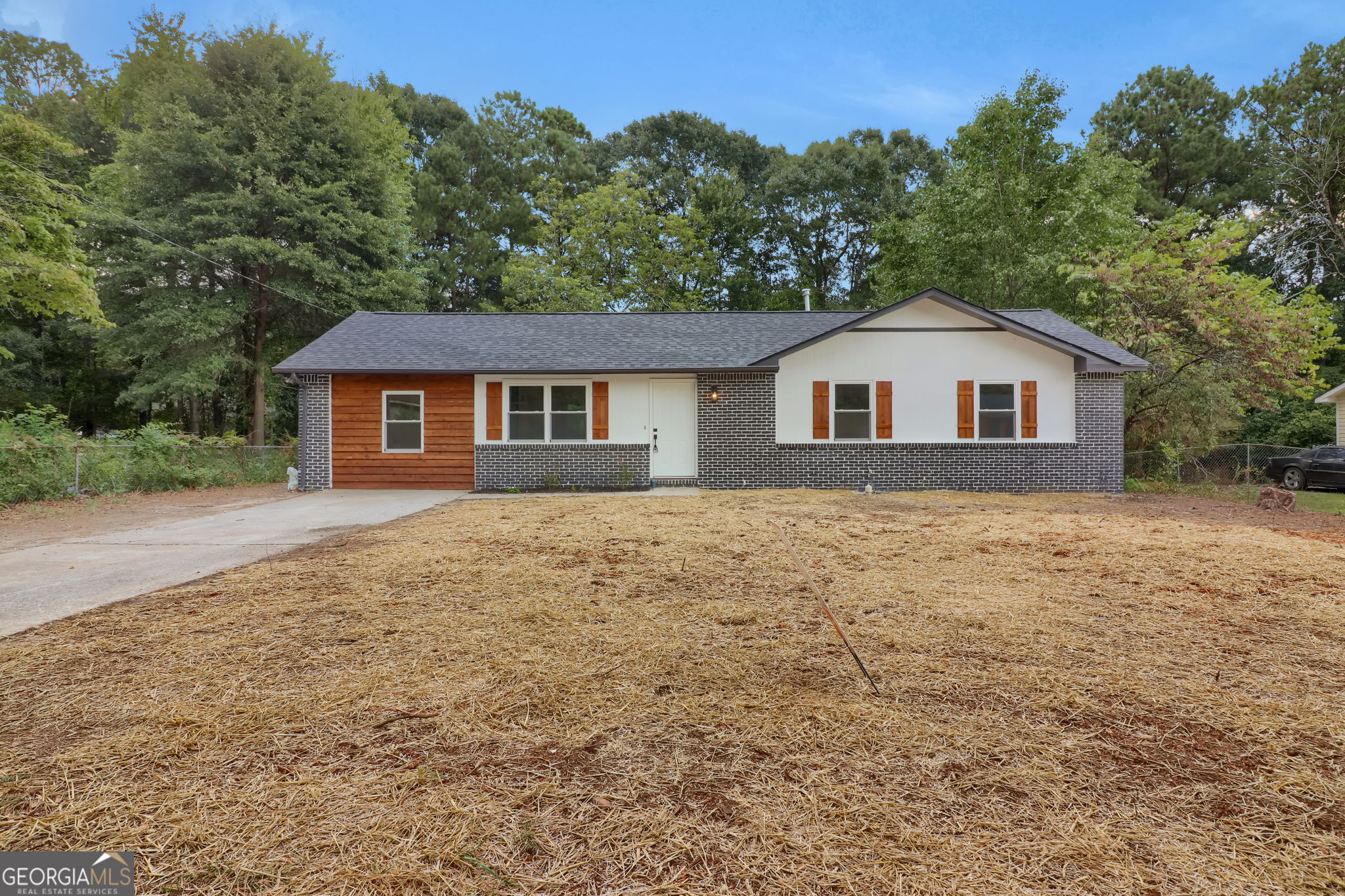 Welcome to this beautifully remodeled ranch-style home, perfectly blending modern updates with timeless charm. Featuring 4 spacious bedrooms and 2 full bathrooms, this home offers an open-concept layout ideal for both everyday living and entertaining. The fully renovated kitchen boasts brand-new cabinets, quartz countertops, stainless steel appliances. Fresh flooring, updated lighting, and neutral paint run throughout, complemented by new windows that flood the space with natural light. Both bathrooms have been completely updated with designer tile, new vanities, and fixtures. Enjoy the expansive backyard perfect for relaxing or hosting guests. Conveniently located in a quiet, established neighborhood near parks, shopping, and schools, this move-in-ready home is a rare find!