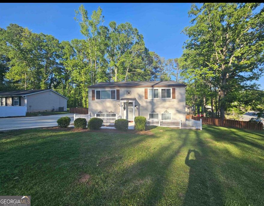 Excellent Investment Opportunity in Desirable Peachtree City, GA, Dual-Income Property in Fayette County School District!! This spacious 5BR/3BA home is divided into two separate units: 3BR/2BA upstairs and 2BR/1BA downstairs. Both units are tenant occupied, producing a total of $3770/month in rental income, and the current owner pays utilities, averaging $400 net rental income is $3370/month. Features include a 5-year-old  HVAC, a level fenced yard, a lower-level concrete patio, and an upper-level deck with French doors. Upper tenant is month-to-month; lower tenant has a 12-month lease. Conveniently located near shopping, dining, and Peachtree City's golf cart paths. Ideal for investors or multi-generational living! Schedule your showing today.