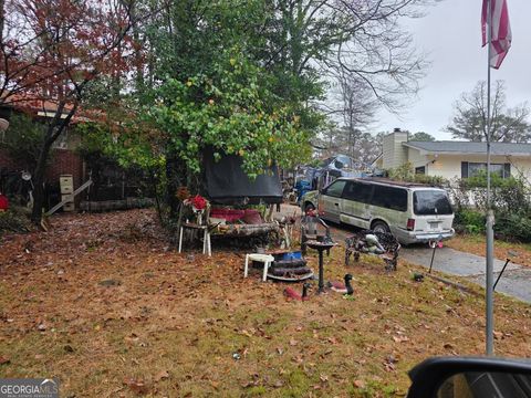 Photo of 1215 Stoneham Court, Atlanta, GA 30349 (MLS # 10805169)