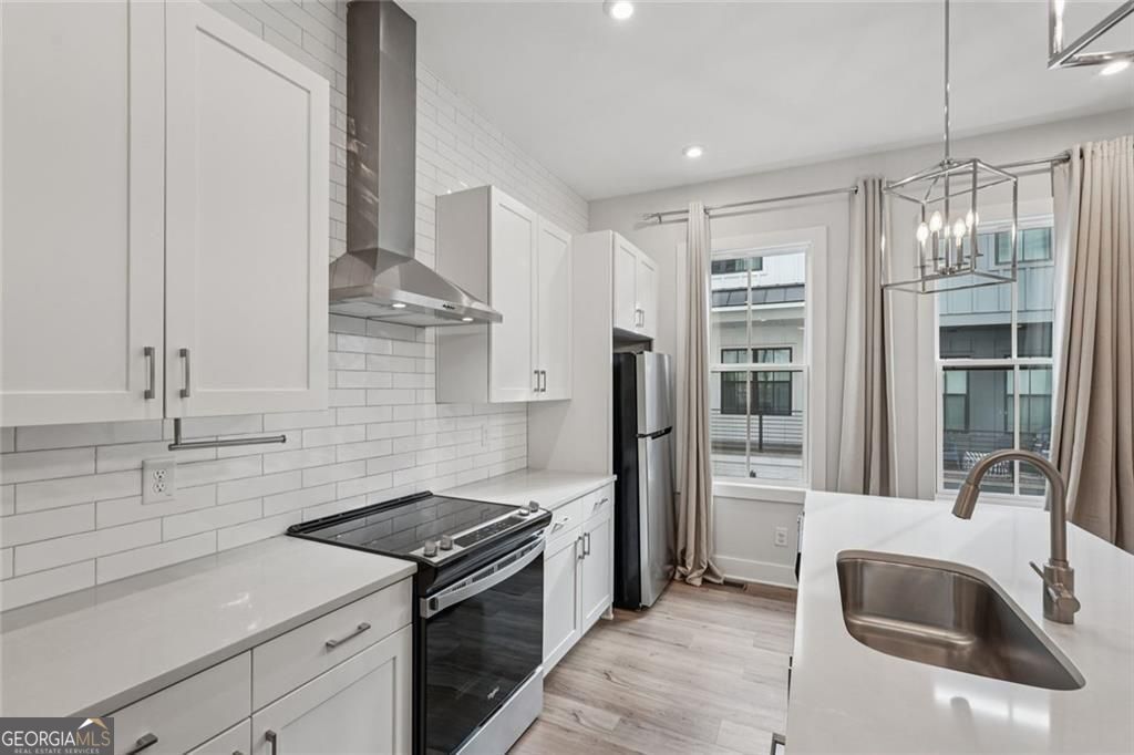 Photo of 193 Chestnut Circle NE #38, Atlanta, GA 30342 (MLS # 10698969)