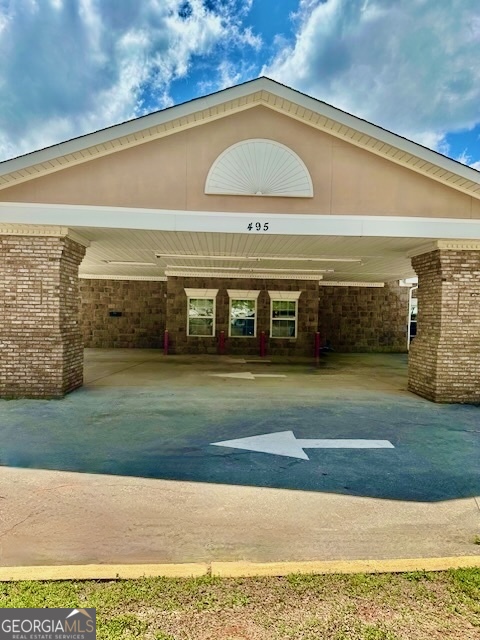 EXCELLENT LOCATION. NEAR THE NEW 2000 ACRE ROWEN PROJECT at Highway 316. 13,467 sq. ft. Building located on 4.9 acres, originally developed as a daycare. This renovated building was used as a school. Well maintained, grease trap installed. Could potentially be rezoned for medical offices with plenty of parking.