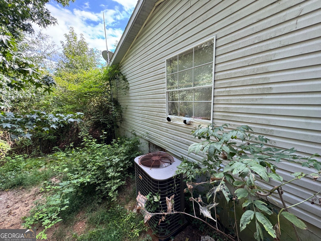 Photo of 1675 Highway 101 S, Temple, GA 30179 (MLS # 10824159)