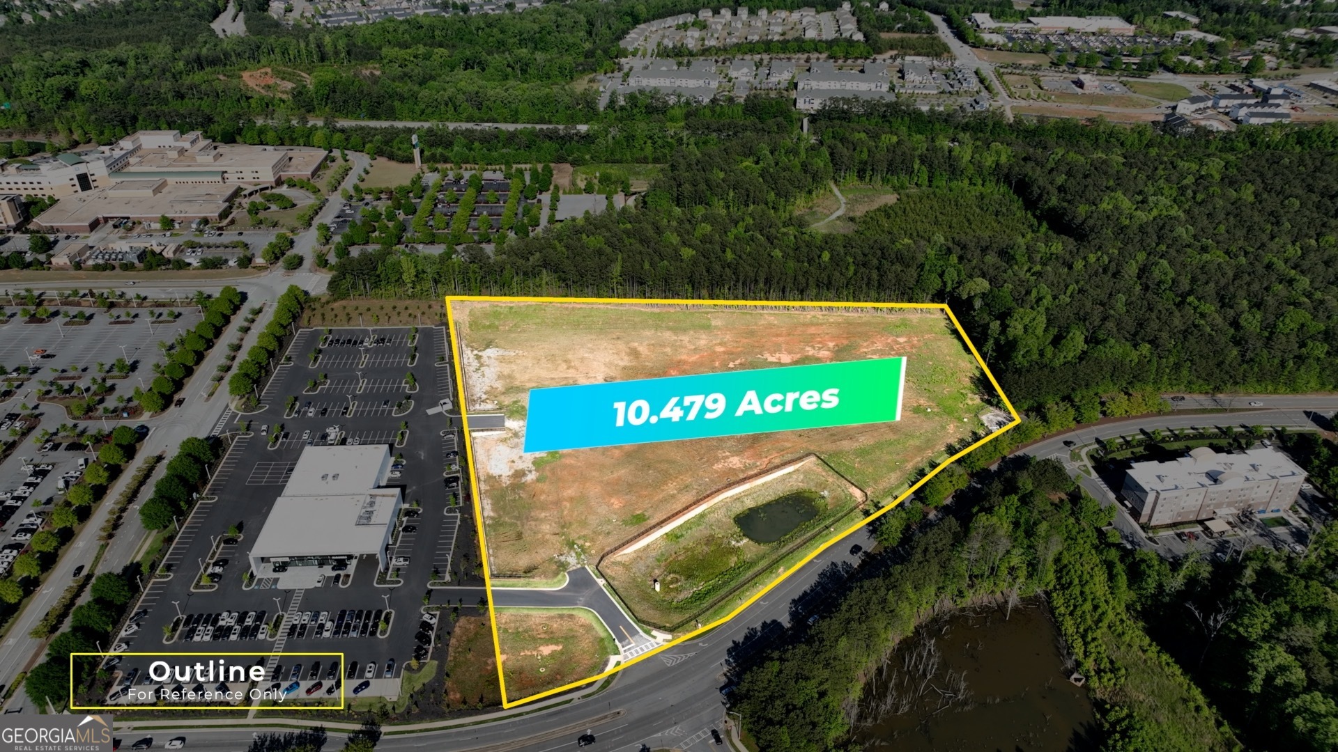 Located on the high-traffic Newnan Bypass in a bustling commercial district, this prime 10.48-acre parcel offers an exceptional development opportunity. Directly across from Ashley Park, this property is perfectly positioned for a variety of commercial uses. The land is graded and pad-ready, with essential infrastructure such as water, sewer, and detention already in place, saving you time and development costs. Featuring two curb cuts for easy access, this site ensures excellent visibility and accessibility for customers and clients. Whether you plan to build a retail center, office complex, or another commercial venture, this property provides the perfect foundation for success.  For more details or to schedule a viewing, please contact Keith Brady at 770-328-3659 or KBrady@jybrealty.com. Don't miss out on this outstanding commercial development opportunity in one of Newnan's most desirable locations!