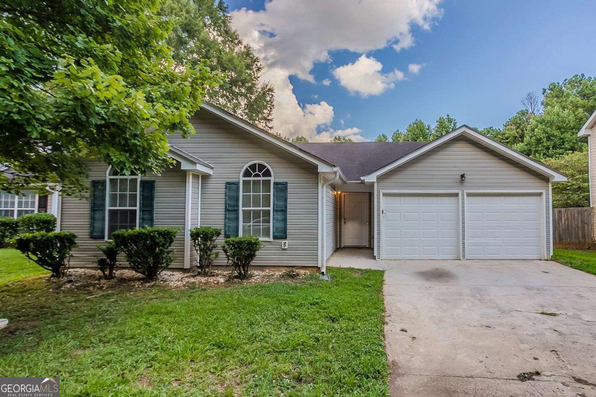 Welcome to this single-story gem tucked inside the Stonebridge Creek Estates community. Step into a spacious great room with a fireplace that seamlessly connects to the dining area and kitchen-ideal for everyday living or entertaining. The split-bedroom layout offers privacy, with a generous primary suite featuring a soaking tub and separate shower. The level backyard provides a blank canvas for outdoor enjoyment. With just a little cosmetic refresh, this home holds strong potential for buyers looking to personalize or investors seeking a solid opportunity.