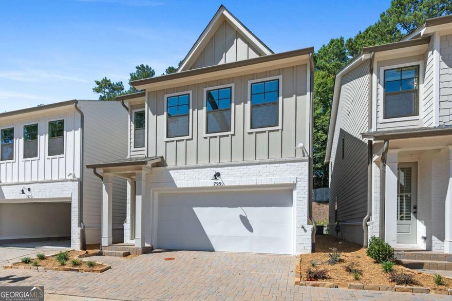 Come Make this 1 year Old New Construction Single Family Your Home Today! This 3/2/1 Home has more Sq Footage than others located In The Wonderful Gated Community of The Village at Towne Lake. This Complete, Bright and open Floor Plan Features LVP Flooring throughout Main Level. Large Kitchen featuring Quartz Countertops, Kitchen Island w/ bar & Tons of Cabinet Space. Modern, electric fireplace in palatial Family/Living room. All bedrooms upstairs Feature New Carpet, including the Primary suite w/ Double Vanity & spa like shower. 2 Good Size Secondary Bedrooms w/ Shared Bath. Laundry room conveniently located upstairs. Neighborhood amenities Include gorgeous clubhouse, pool, and pickle ball courts. Perfect location to Downtown Woodstock, dining, shopping, medical facilities, and I-575 and More.