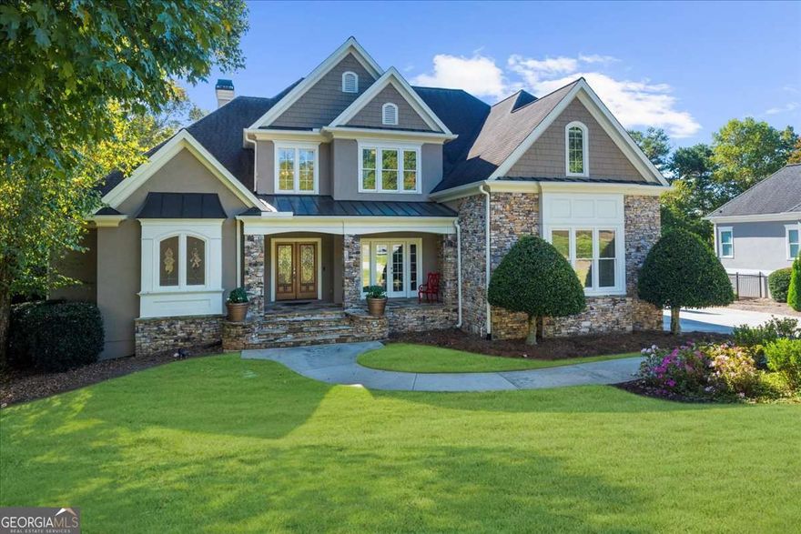 Designer's Own Masterpiece - Fully Remodeled and Impeccably Curated  Truly one of the most custom-designed homes in Laurel Springs, this residence reflects unparalleled attention to detail and sophisticated craftsmanship at every turn. From the specially formulated wood stain on the floors to the expansive covered porch and resort-style pool, every inch of this home has been thoughtfully and professionally curated.  Step inside and you'll immediately notice the exceptional finishes and refined aesthetic that define this designer's personal home. The exquisite kitchen is a showcase of form and function, featuring custom cabinetry, built-in Miele appliances, marble and soapstone surfaces from Marmi Stone, Robert A.M. Stern architectural tile, Hudson Valley lighting, and individually zoned illumination throughout. Hidden details abound - a pantry seamlessly integrated into the cabinetry, filtered water at both sinks, and a microwave that doubles as a full electric oven.  Each of the home's bathrooms has been fully renovated - including four en-suite baths, a full hallway bath in the terrace level, and a stylish powder room for guests, ensuring the primary suite remains a private retreat.  The outdoor living area is equally impressive, with a stunning custom-covered porch - complete with a designer rug and glass rails - overlooking the sparkling saltwater pool and the 7th Fairway of the Laurel Springs Golf Course. Doors from the living room and kitchen open directly to this space, creating an effortless flow for indoor-outdoor entertaining.  Additional highlights include Schumacher window treatments and wall coverings, custom natural woven shades, and a serene location on a quiet cul-de-sac street adjacent to the neighborhood's green space and play area.  Remodeled by the designer-owner with no detail overlooked, this home is a breathtaking statement of luxury, style, and comfort inside the premier gated, guarded neighborhood of Laurel Springs with top ranked Forsyth County schools.