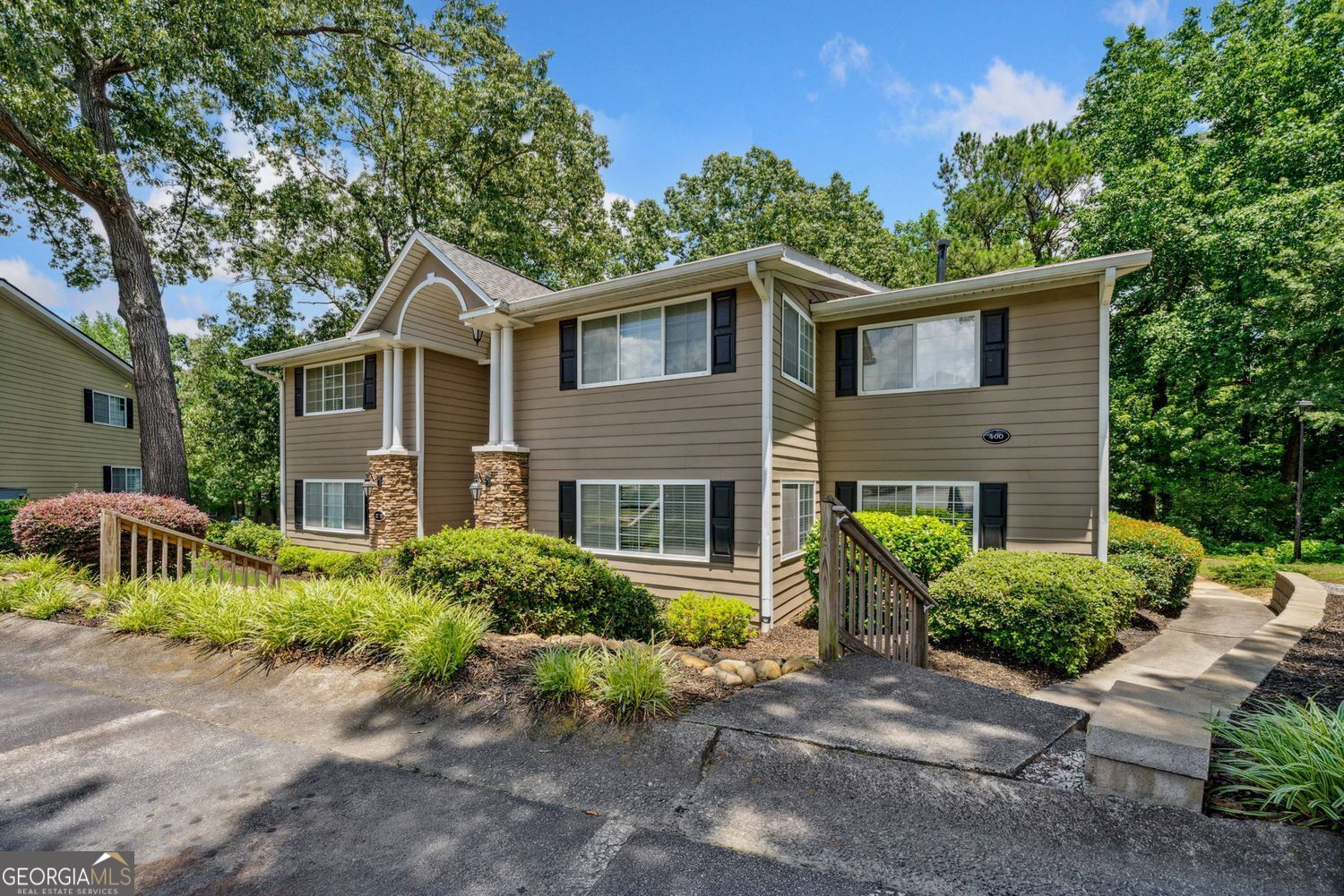 Welcome to this inviting MAIN LEVEL condo that offers comfort, convenience, and a prime Brookhaven location - Right across from scenic Briarwood Park and Community Center, home to trails, tennis courts, pool & splash pad, playground & and indoor basketball court. This end unit offers a sunroom that fills the space with natural light and overlooks the communities greenspace. Perfect for relaxing or working from home. The kitchen features granite countertops and plenty of cabinet storage, making meal prep and entertaining easy. The primary bedroom includes a generous walk through closet with an attached laundry room, providing function and ease. Community amenities include a sparkling pool, well-equipped fitness center and plenty of green space to enjoy. All of this in an unbeatable location near shopping, dining, MARTA, and major highways. Don't miss this opportunity to enjoy comfortable, low-maintenance living in one of the best spots in town!
