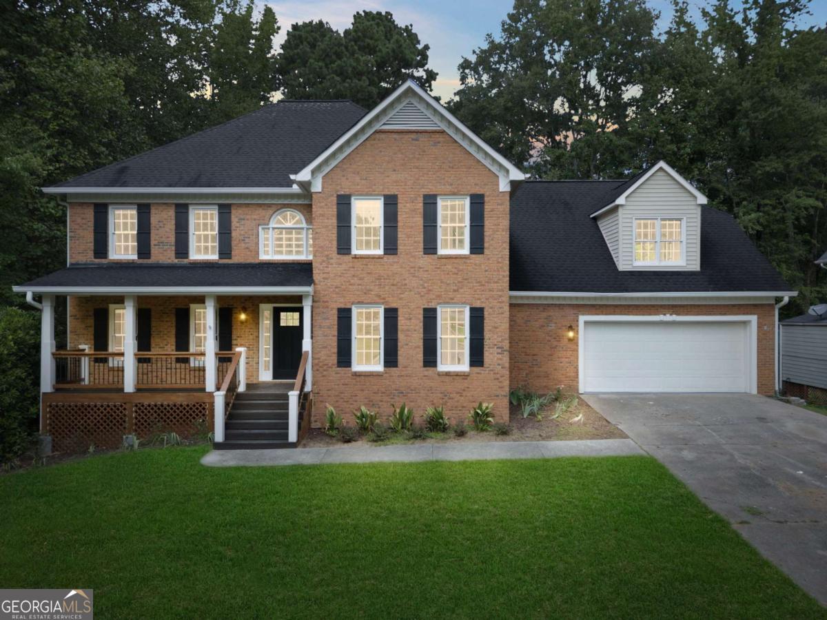 Step into this beautifully renovated home that blends modern updates with timeless charm. Inside, you'll find brand-new hardwood flooring, fresh paint throughout, and a completely redesigned kitchen featuring stylish cabinetry, countertops, and upgraded appliances. Both bathrooms have been fully transformed with sleek finishes, offering a spa-like experience. The oversized master suite is a true retreat with its luxurious en-suite bath-complete with a double shower and a relaxing soaking tub. Spacious secondary bedrooms and an open layout create a comfortable flow for everyday living and entertaining. This home is move-in ready and designed to impress with thoughtful upgrades in every detail.