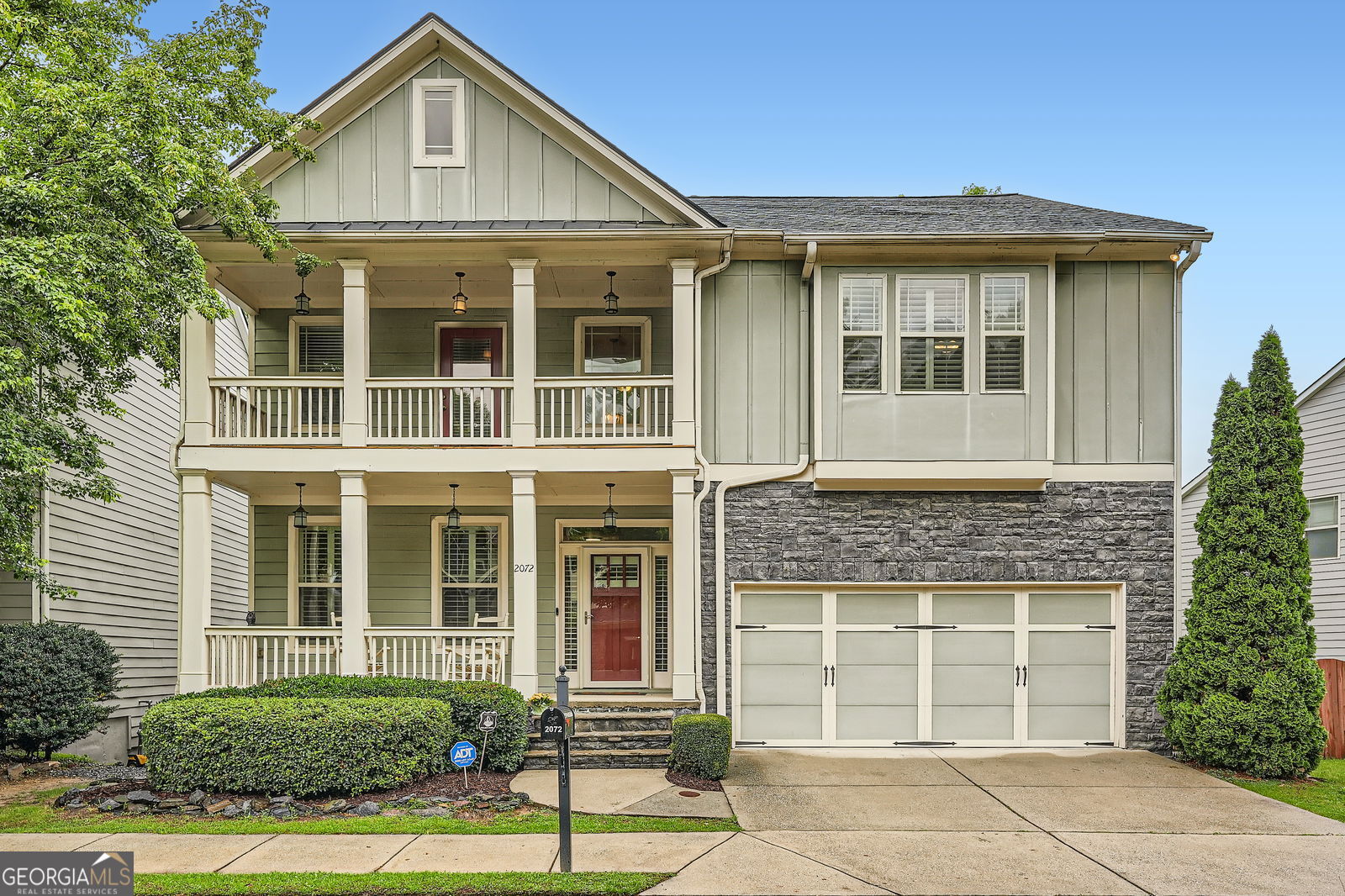 Beautiful home in Atlanta's upper west side known as Riverside. Do you like porches and patios? Enjoy 4 in this home! Craftsman style architecture highlighted with stacked stone accents. This homesite is backed by a nature preserve area of the community for an extra level of privacy. Upon entry, the vaulted foyer opens to formal dining room or office space with hardwood flooring throughout the main floor. 6 bedrooms (2 on terrace level plus full bath). You'll love the convenience of powder room, laundry room and mud-room just off of the garage entrance and kitchen. One bedroom is located on the main level. Home features 3.5 baths. Living room showcases stacked stone gaslog fireplace with a wall of windows. This open floor plan makes entertaining a breeze as you flow from the Chef's Kitchen with stainless steel appliances to the Eat in Kitchen area which both overlook the living room with fireplace. Plantation shutters have been installed throughout the home. The upstairs flooring has already been upgraded with brand new Lux Vinyl Hardwood and upgraded thick-pile carpeting. Bright lower level family room features a beautiful bar including designer bar stools with shiplap accent wall and opens to fenced yard with a playset included! Additional Media/Game room and tons of storage. Two full bedrooms on lower level with walk-out yard access. HUGE oversized Owner's Suite with Sitting Room. Owner's Suite spa-like bath with separate tub and shower, private water closet plus large walk-in closet. Close to West Midtown, Moore's Mill, Buckhead and more! The new homeowners will enjoy a Swim, Tennis and Clubhouse lifestyle.