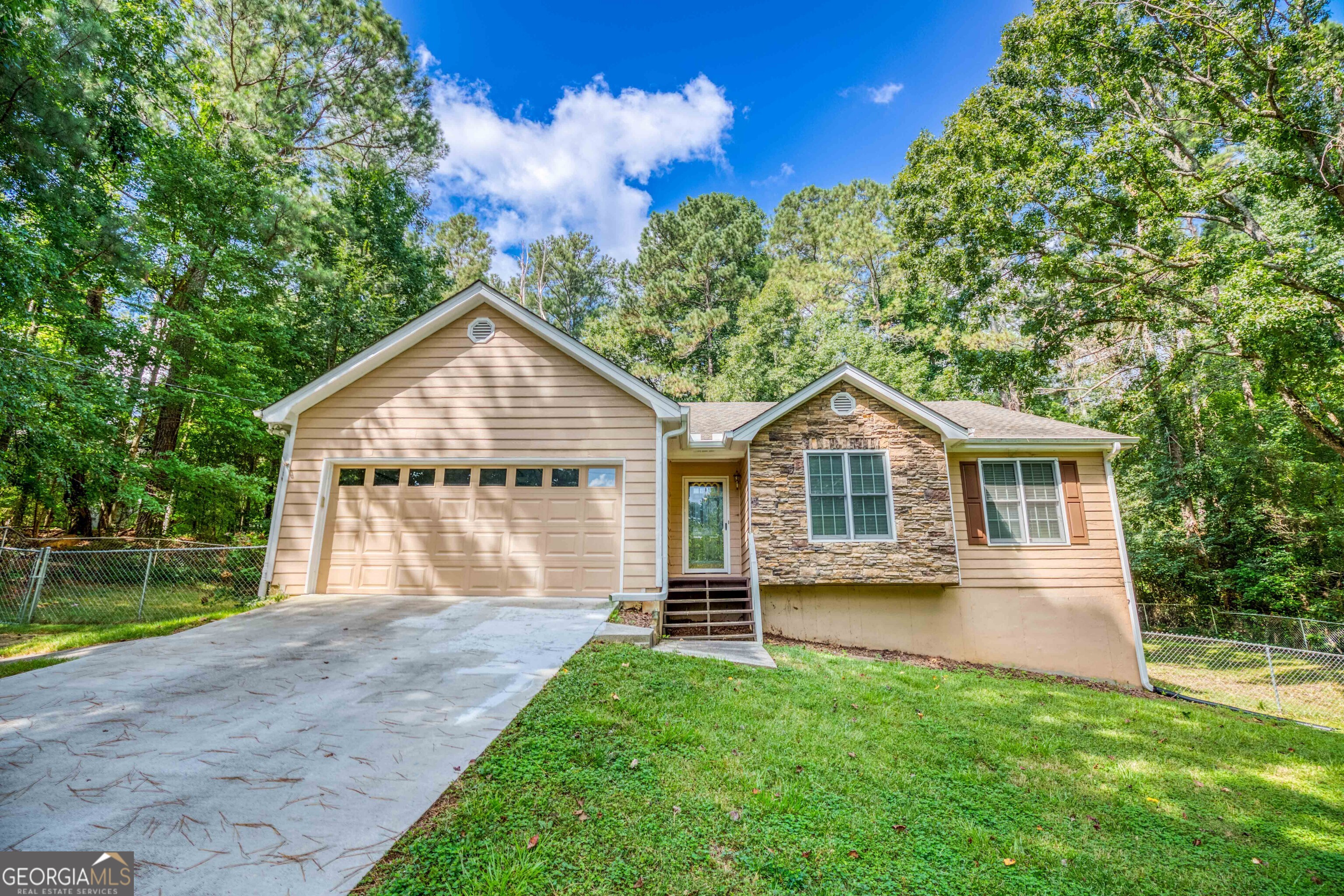 This is the one you've been waiting for! This charming 3-bedroom, 2-bathroom home is tucked away on a quiet cul-de-sac street and offers the perfect blend of comfort and convenience. Step into the spacious, vaulted family room featuring a cozy fireplace ideal for relaxing or entertaining. The kitchen is a standout with granite countertops, wood cabinetry, pantry, and all appliances included. Enjoy the privacy of a split-bedroom layout. The oversized owner's suite and a beautifully appointed ensuite with a garden tub, separate shower, double vanity, and a walk-in closet. The secondary bedrooms share a full hall bath with tile floors, and a tub shower combo. Step outside onto the back deck that overlooks a fully fenced backyard perfect for kids, pets, and outdoor gatherings. Additional features include a 2-car garage and a crawl space foundation. Conveniently located near shopping, dining, and everyday essentials. Don't miss this opportunity to make it yours!