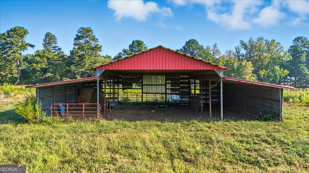 The perfect mini farm location in the heart of the Antioch community. Everything you need to raise crops and animals. Huge pole barn sits on 22 beautiful acres of pasture land for your cows or horses. Large pond supplies plenty of water. Lots of garden spots to raise wholesome vegetables in the summer. Good road frontage for home sites or build on the back side of the property for extra privacy. Located between Rockmart and Cedartown, quite country living yet close to shopping and jobs.