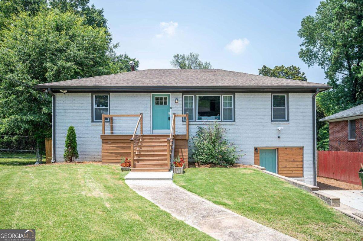 ***NEW ROOF 2025***Chic 4BD/4BA in SW Atlanta! This renovated single-family home lives like a duplex with a full kitchen plus kitchenette, multiple living areas, and separate entrances-perfect for multi-generational living or rental income potential. Furniture is negotiable and this home is truly move-in ready. Conveniently located near the BeltLine, downtown, Mercedes-Benz Stadium, and major highways, this versatile home is a rare find.