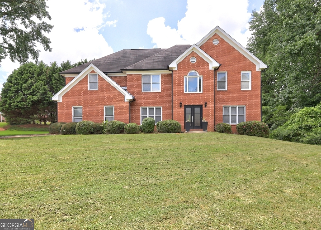 WOW! Up to $30,000.00 in concessions* for this Remarkable 4-Sided Brick Home in Southland Golf Community Welcome to this stunning 4-bedroom, 3.5-bathroom residence nestled in the sought-after Southland Golf community. With 3,571 square feet of well-designed living space, this home offers elegance, comfort, and functionality. Step through the grand 2-story foyer into a spacious layout featuring a formal dining room that seamlessly connects to the soaring 2-story Great Room-perfect for entertaining or relaxing with loved ones. Enjoy a bright, functional kitchen that offers stainless steel appliances, a double oven, plenty of cabinet space, and an eat-in area ideal for casual meals. The flex room adds a touch of versatility, ideal for a home office, playroom, or additional sitting area. Gleaming hardwood floors, wrought iron stair railings, and an open catwalk create a dramatic and welcoming atmosphere. The generously sized secondary bedrooms include a junior suite with a private ensuite, while the oversized Primary Suite is a true retreat, complete with two sitting areas and a spa-like bathroom. Additional features include a side-entry garage and access to a wide range of community amenities, including a golf course, swimming pool, tennis courts, and a children's play area. This home blends timeless architecture with modern comfort, offering a lifestyle of convenience and charm in a beautiful golf community setting.
