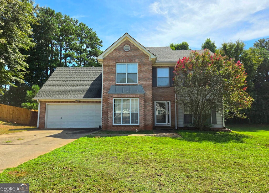 Photo of 309 Madison Ave, Hampton, GA 30228 (MLS # 10829616)