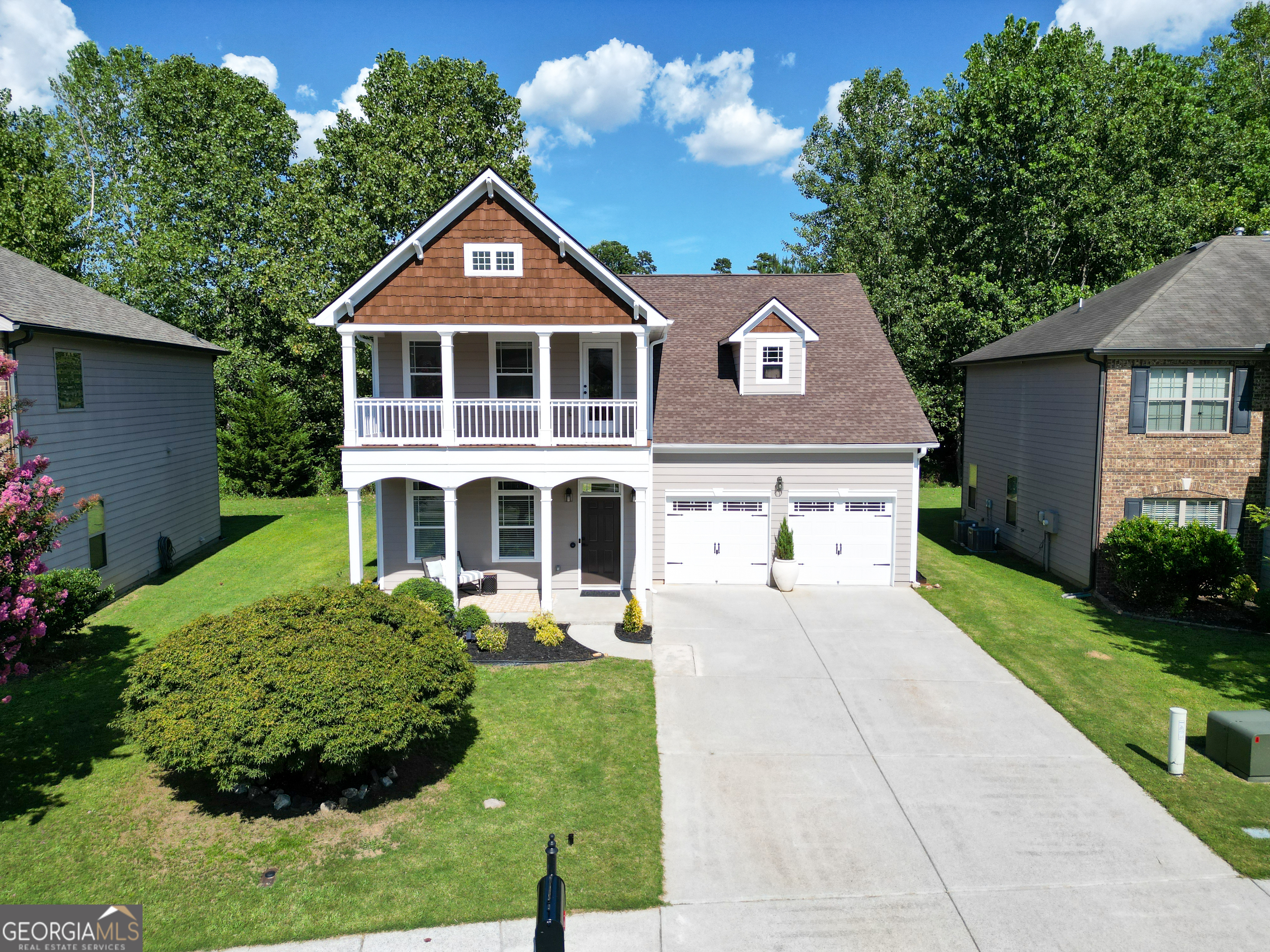 Welcome to 5962 Lexington Way - where comfort, community, and convenience come together in the heart of Braselton's highly sought-after Riverstone Park. This 4-bedroom, 3-bath ONE OWNER home offers a thoughtful layout with plenty of space to live and grow. You'll find neat touches throughout this house that make it something truly special. On the main floor, you'll find hardwood floors throughout the living, dining, kitchen and nook, a cozy fireplace in the living area, and a fully equipped kitchen with a pantry, breakfast bar, and open-concept dining area-perfect for everyday meals or entertaining friends. A full bedroom and bathroom on the main level provide a flexible space for guests, in-law suite or a private office. Upstairs, the oversized primary suite is a true retreat, featuring a large separate sitting area which really could be another bedroom of its own, a spacious en-suite bath, and a large walk-in closet. Two additional bedrooms share a generously sized bathroom, and brand-new carpet throughout the second floor adds a fresh touch. Step outside to a huge, flat backyard with a patio and a fruit-producing fig tree-ideal for summer barbecues, playtime, or simply relaxing in your own private oasis or enjoy the outdoors with your morning coffee from your 2nd story balcony. A two-car garage adds to the home's convenience and functionality. Living in Riverstone Park means becoming part of a vibrant, golf cart-friendly community known for its neighborly atmosphere and fun social events. Enjoy incredible amenities including a swimming pool, tennis and pickleball courts, two playgrounds, and easy access to local favorites like Starbucks and Chick-fil-A-just a quick hop, skip, or golf cart ride away. This is the kind of neighborhood people rarely leave; they simply move from one home to another within the community. Don't miss your chance to make this Riverstone Park gem your own.