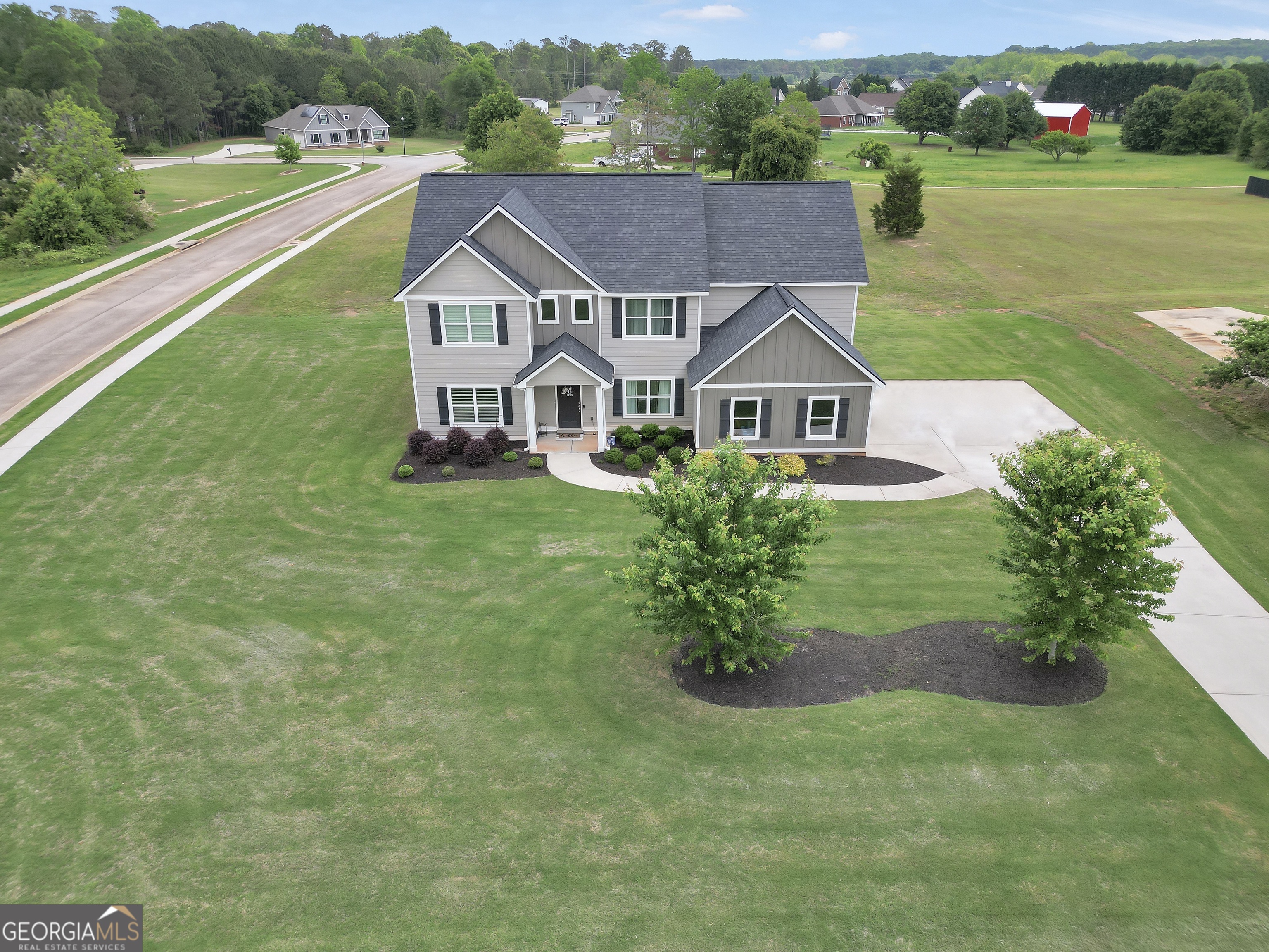 488 Brown Station - Corner-Lot Beauty in Williamson, Pike County! Step into comfort and style with this spacious corner-lot home that perfectly blends charm and modern updates. The large backyard is ideal for BBQs, games, and evenings under the stars, while inside, wide-plank floors and designer lighting set the tone. The chef-inspired kitchen features quartz counters, stainless steel appliances, and a sleek backsplash that ties it all together. The main-level owner's suite feels like a private retreat with double vanities and a spa-like atmosphere. Upstairs, a huge bonus room is ready for movie nights, home office needs, or a playroom, plus a second living area gives everyone space to spread out. With convenient access to Griffin, Senoia, and Peachtree City, this home offers both small-town charm and big-city connections. A buyer's choice home warranty (up to $500) is included with an acceptable offer. Don't wait-your next chapter starts here. Book your private tour today!