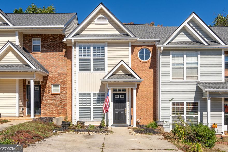 Welcome to 15 Pearl Chambers in Dawsonville, GA! This charming 2-bedroom, 2.5-bathroom townhome offers a comfortable and spacious living experience. Step inside to an inviting open floor plan on the main level, perfect for relaxing and entertaining. The kitchen is fully equipped with all appliances, making it a breeze to prepare meals. You will also find convenient laundry facilities on the main level for added ease. Upstairs, the oversized primary bedroom is a true retreat, featuring an en-suite bathroom for ultimate privacy and comfort. A cozy guest room and a second full bathroom complete the upper level, offering space for family or visitors. New carpet throughout. Enjoy the tranquility of a quiet lot and unwind on your private patio, which also includes handy storage. Whether you are looking for a starter home, a downsizer, or simply a peaceful retreat, this townhome has everything you need. Don't miss your chance to make this one your own!