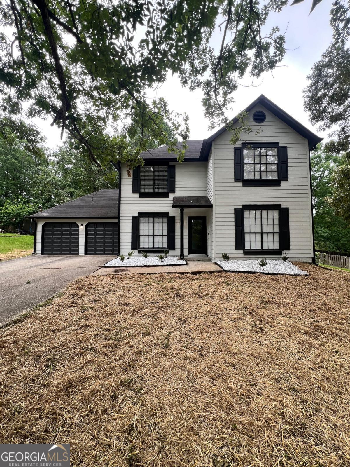 This beautifully updated 3-bedroom, 2.5-bath home is move-in ready and perfectly located just 15 minutes from the airport and 5 minutes from shopping, schools and dining-with no HOA! Enjoy a bright, open floor plan with modern finishes throughout. The main level features updated living spaces and a stylish half bath. Upstairs, the spacious primary suite includes a renovated ensuite with double vanities, a soaking tub, and separate shower. Two additional bedrooms and a full bath offer plenty of space. Situated on a generous lot with room to expand or enjoy outdoor living. Incentives with preferred lender.