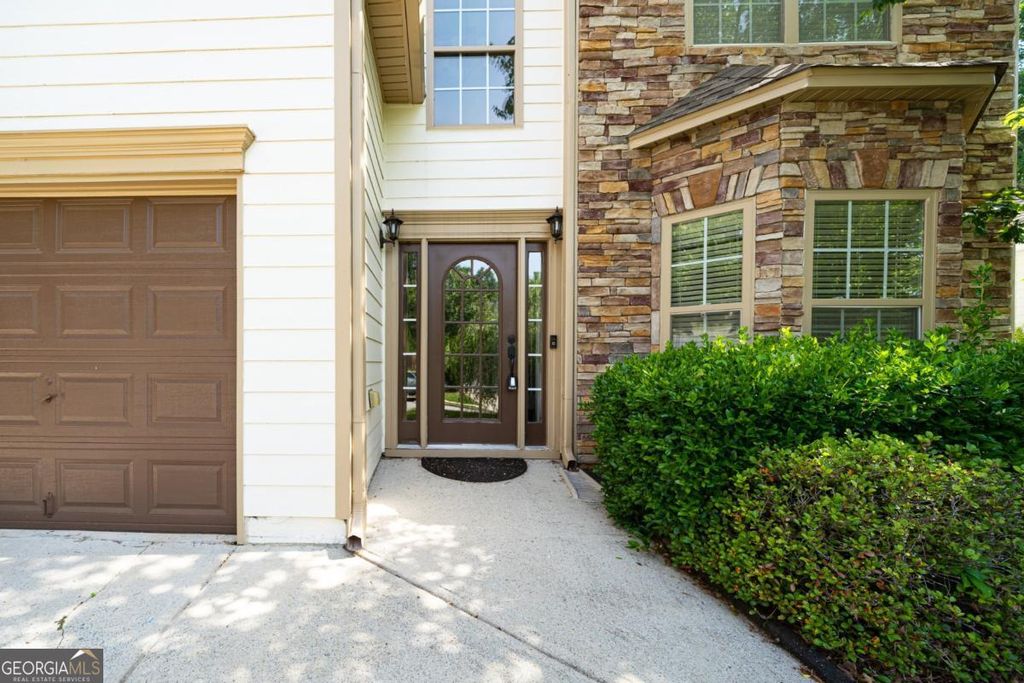 Photo of 715 Moonlight Way, Suwanee, GA 30024 (MLS # 10770623)
