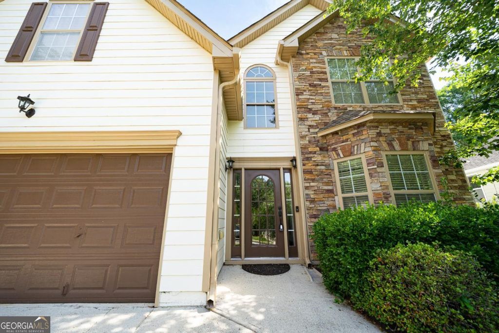 Photo of 715 Moonlight Way, Suwanee, GA 30024 (MLS # 10770623)