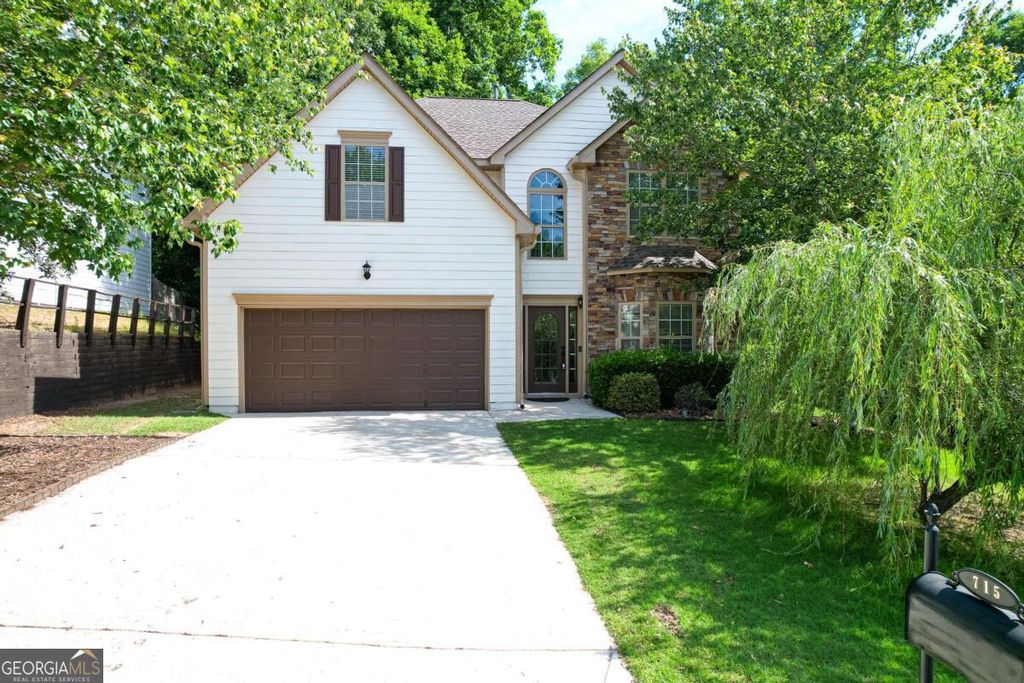 Photo of 715 Moonlight Way, Suwanee, GA 30024 (MLS # 10770623)