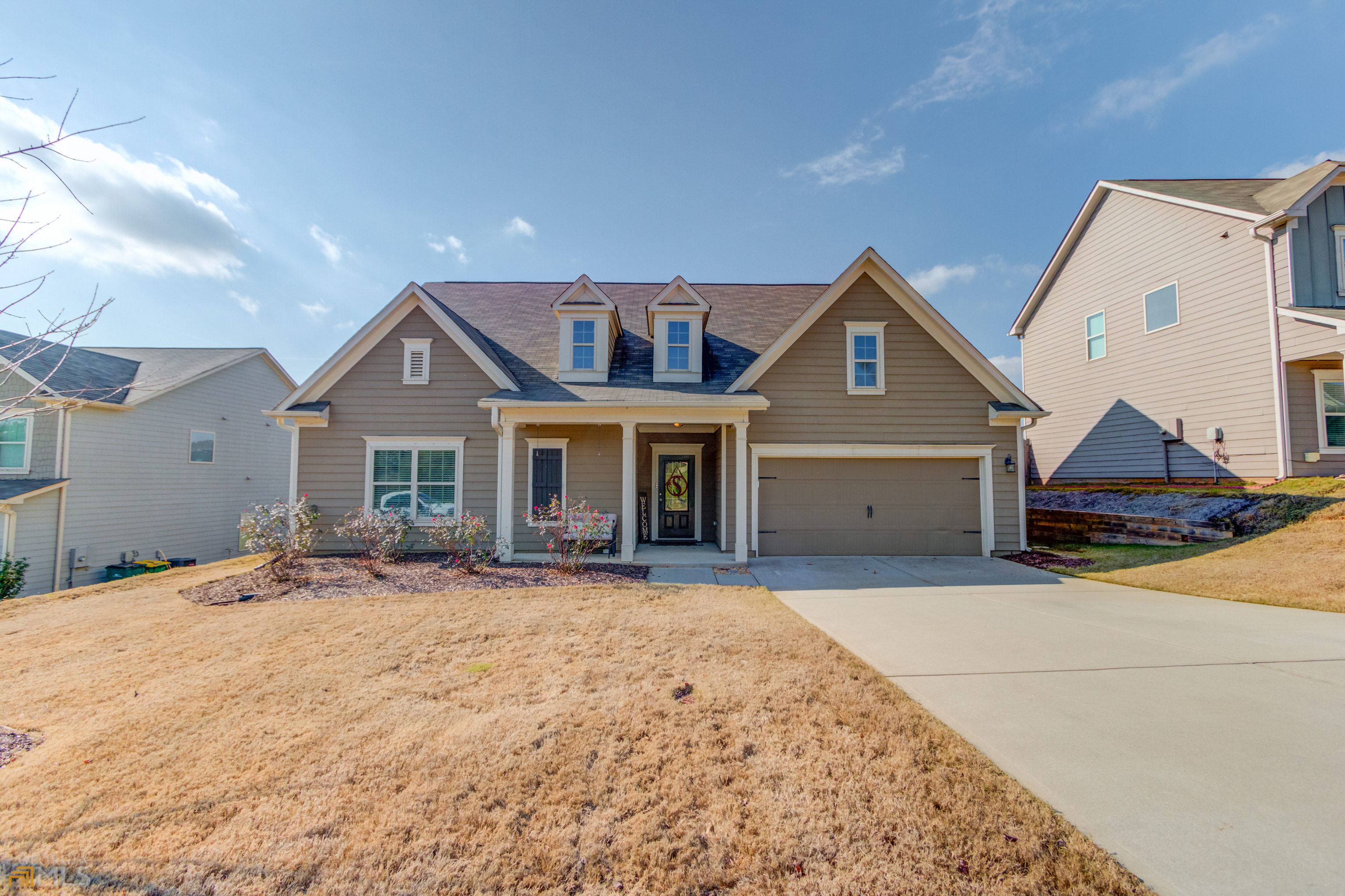 LIKE NEW!!! A MUST SEE RANCH Floor Plan that features an open concept complete with a large kitchen island and an oversized living area. This meticulously well cared for home has so much to offer from a custom mud room off the garage to a private fenced in backyard with beautiful trees that bloom spring and summer, a large laundry room connected to the master and bedrooms...no more carting around heavy laundry baskets! The large bonus room makes a fantastic man cave, craft room or play room complete with lots of storage! Roof - 4 Years Old... HVAC - 4 Years Old ...Water Heater - 4 Years Old... Lighting Fixtures Updated! Move in and begin living! Master Closet is Gigantic with lots of hanging room and plenty of space to keep everything super organized. Home is very convenient to 316, I-85 and any shopping you can imagine. Plus, Fort Yargo is literally across the street for all your recreation!