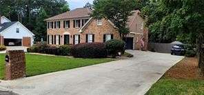 Beautiful Traditional Dunwoody home near Georgia State University @ Perimeter, Dunwoody Elementary, and Dunwoody High School. This is a carpet-less home! Awesome family room with fireplace. Modern kitchen with plenty of storage. Bedroom and full bathroom on main level. Upstairs has 5 large bedrooms including Owner's bedroom with 2 additional bathrooms. Optional use: in-ground pool. Oasis-like private back yard. Finished walk-out basement.