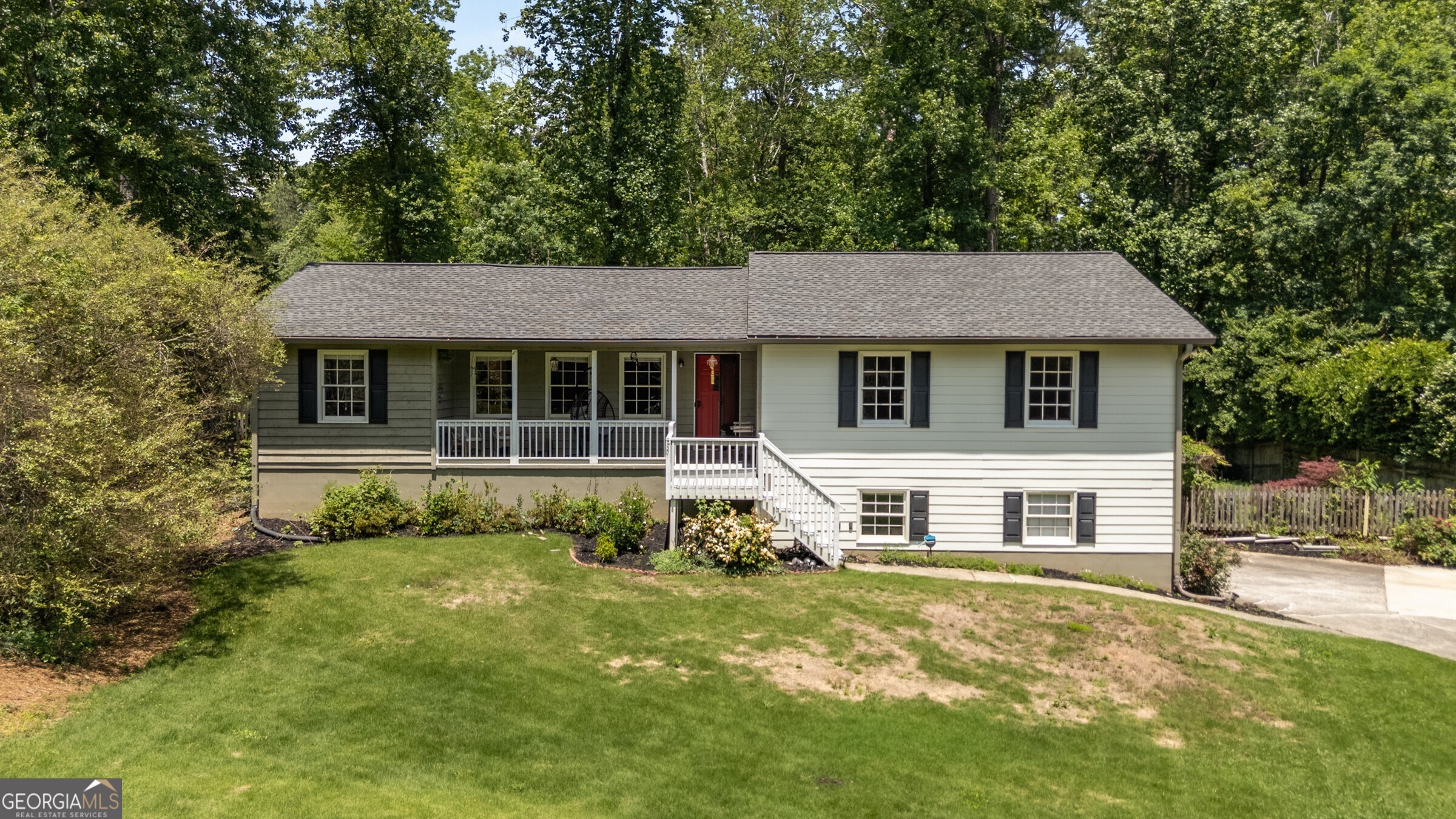 Available for Lease starting July 1st, 2025. Contact listing agent for Application information. Welcome to 2795 Bentwood Drive a beautifully updated 3-bedroom, 2-bathroom raised ranch nestled on a quiet cul-de-sac in the heart of East Cobb. Located in the sought-after Pope High School district, this home offers a perfect blend of modern updates and classic charm. As you step through the covered rocking chair front porch, you are welcomes by an open-concept living space adorned with real hardwood floors and vaulted ceilings. The living room, soaked in natural light, features a cozy stone gas-log fireplace, creating a warm and welcoming atmosphere. The renovated kitchen is equipped with quartz countertops, stainless steel appliances, subway tile backsplash, and a custom island. Walk from the kitchen to a spacious back deck, perfect for outdoor entertaining, overlooking a fenced backyard. Additionally, with easy access to the back porch, the sunroom, with double-pane windows, offers a flexible space for relaxation or a home office, providing 180 degree views of the backyard. The main-level primary suite features hardwood floors, two closets, and a renovated bathroom with a double vanity, and separate wet room. The two additional bedrooms are spacious and just down the hall from the guest bath. The finished basement offers a versatile space with luxury vinyl plank flooring, recessed lighting, and a charming brick nook ideal for a media room, playroom, or home gym. Additional features include a storage room, mudroom entry, and an oversized two-car garage with ample space for a workbench or extra storage. Situated just minutes from East Cobb Park, The Battery, shopping, dining, and with easy access to I-75, I-285, and GA-400, this home offers both convenience and tranquility. Next year, snag a membership at the nearby East Cobb Swim and Tennis Club to enhance the community experience. Don't miss the opportunity to own this move-in-ready gem in one of Marietta's most desirable neighborhoods! Reach out to Patrick Casey, listing agent, for more information or to book a showing.