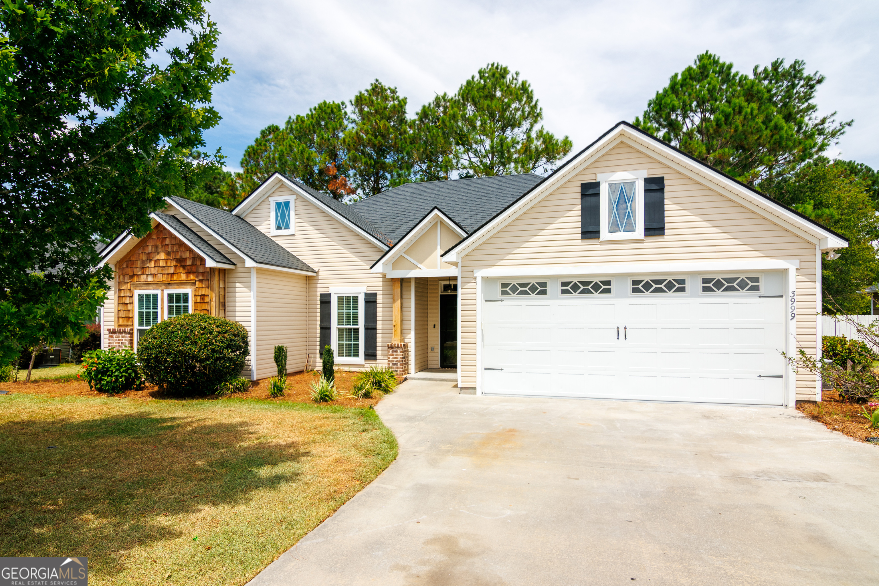 OPEN HOUSE this Saturday, August 9th, from 3:30-5:30 PM!!Welcome to this stunning and spacious 4-bedroom, 3.5-bathroom home located in the desirable Gramercy subdivision - with no HOA! Freshly painted throughout and featuring brand new carpet in all bedrooms, this home is move-in ready with stylish updates and thoughtful design touches. The kitchen is a chef's dream, fully outfitted with brand new stainless steel appliances and plenty of storage, all drenched in natural light for a bright and welcoming feel. The luxurious master suite offers a peaceful retreat with a double vanity, large soaking tub, and a separate tiled shower-perfect for relaxing after a long day. One of the spacious secondary bedrooms features its own private full bathroom, making it ideal as a mother-in-law suite, guest room, or private home office. Step outside and enjoy the screened-in patio, which opens to a fully fenced backyard-perfect for pets, kids, or just enjoying the outdoors. You'll also love the custom wooden bar, designed for entertaining and backyard gatherings. Located in a quiet, established neighborhood with no HOA restrictions, this home gives you the space and freedom to live the way you want. With four generous bedrooms, three full bathrooms, and a convenient half bath, there's plenty of room for everyone. Don't miss out on this rare opportunity-schedule your private showing today!