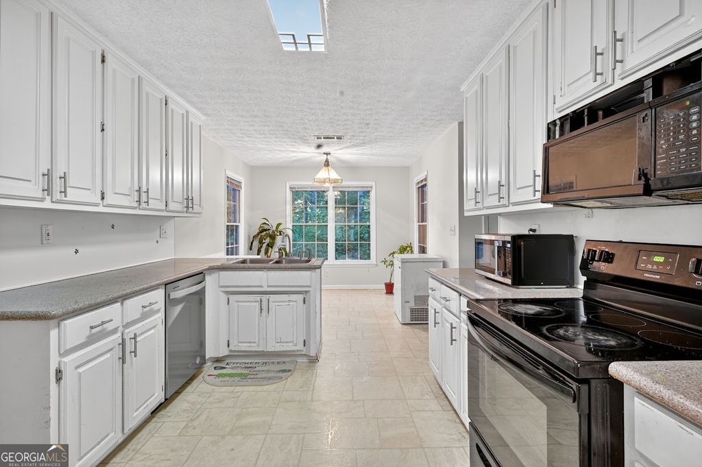 Photo of 3987 Riversong Court, Suwanee, GA 30024 (MLS # 10637674)