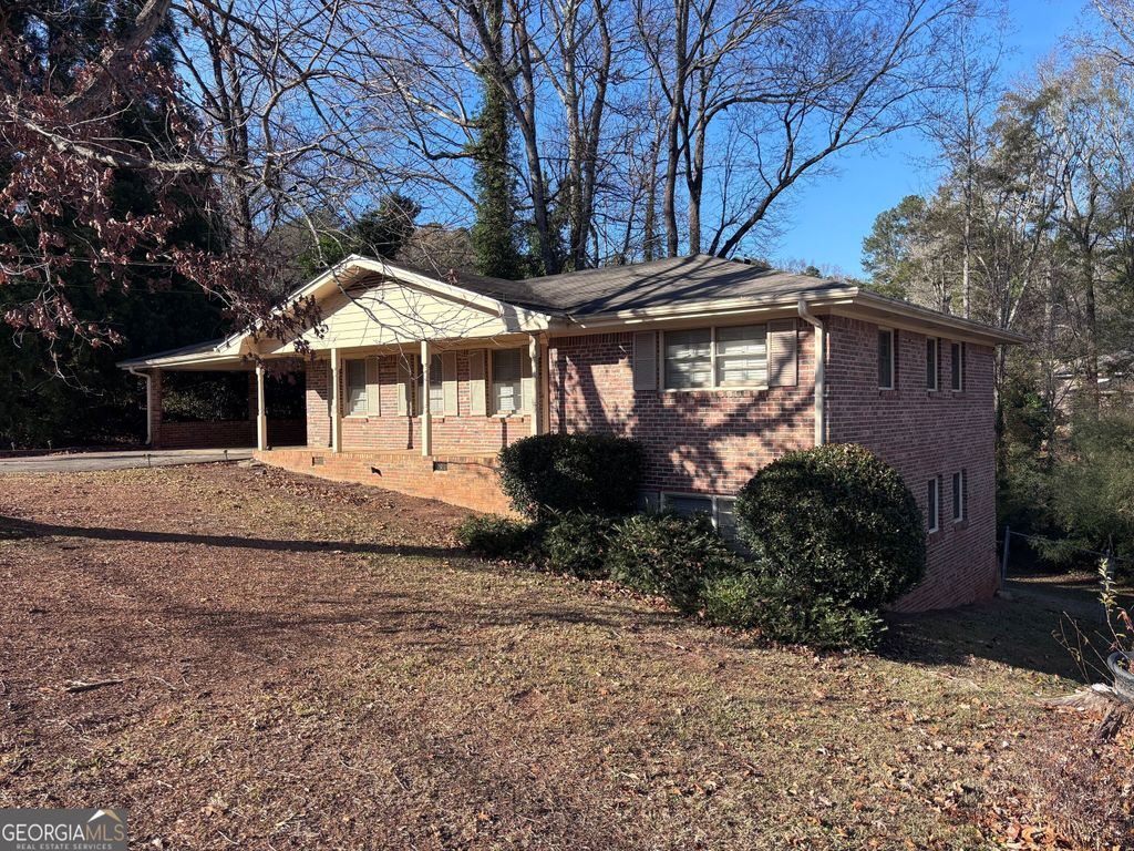 Photo of 4884 Oakside Dr, Stone Mountain, GA 30088 (MLS # 10662881)
