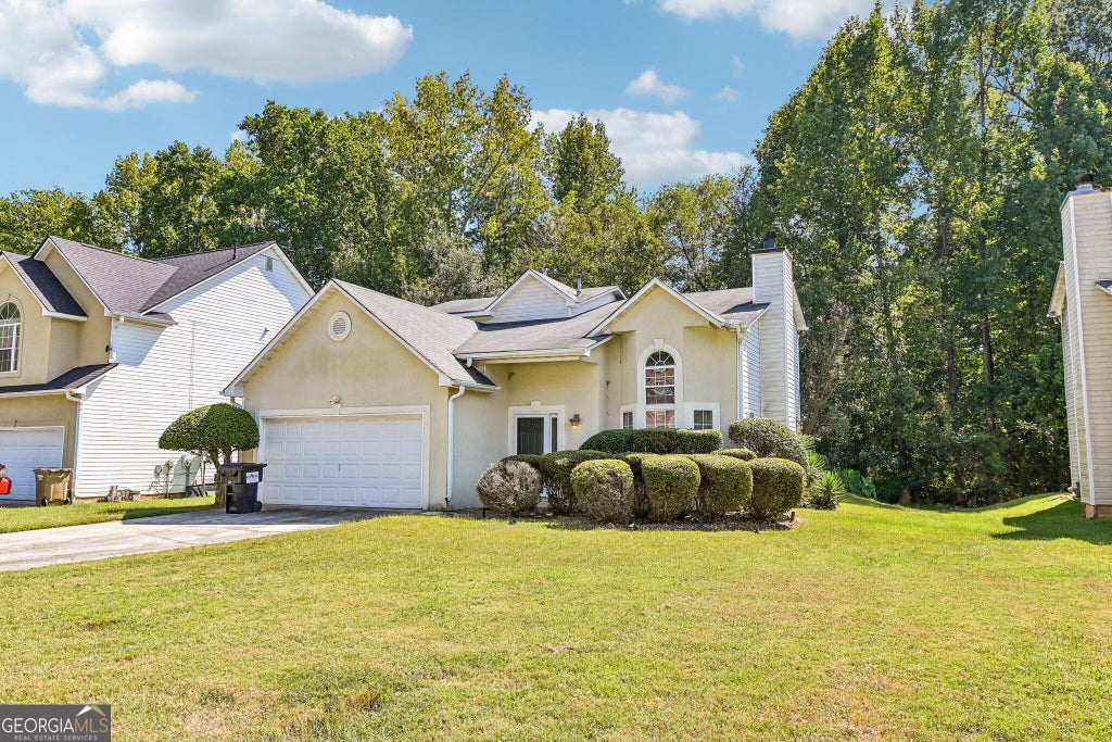 Photo of 1117 W Shore Drive, Riverdale, GA 30296 (MLS # 10858276)