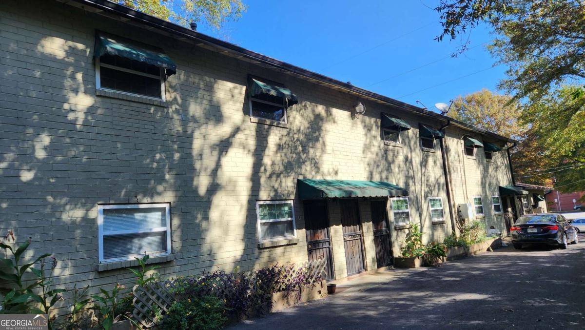 THIS IS NOT A CAP RATE DEAL. NO OWNER FINANCING. 7-UNIT APARTMENT BUILDING IN GREAT LOCATION! 1.5 miles from Georgia Tech. 1.8 miles from downtown Atlanta. 1.5 miles from West Midtown. 1.6 miles from Mercedes Benz Stadium, 1.7 miles to Georgia Aquarium. Six (6) of the seven (7) units are currently under lease contracts at $825/mo. The 7th unit is available for viewing. Each unit - 2bd, 1 bath. Central Air & Heat. Totally electric. This Apartment Building sits in the English Avenue area, .05 miles from Vine City Community. There are several up and coming work and entertainment projects being developed in the general area. Renovations and updates will be needed to enhance the property overall market appeal. Property being Sold "AS/IS". THIS OPPORTUNITY DOES NOT REPRESENT A ROBUST CAP RATE DEAL IN ITS CURRENT CONDITION!