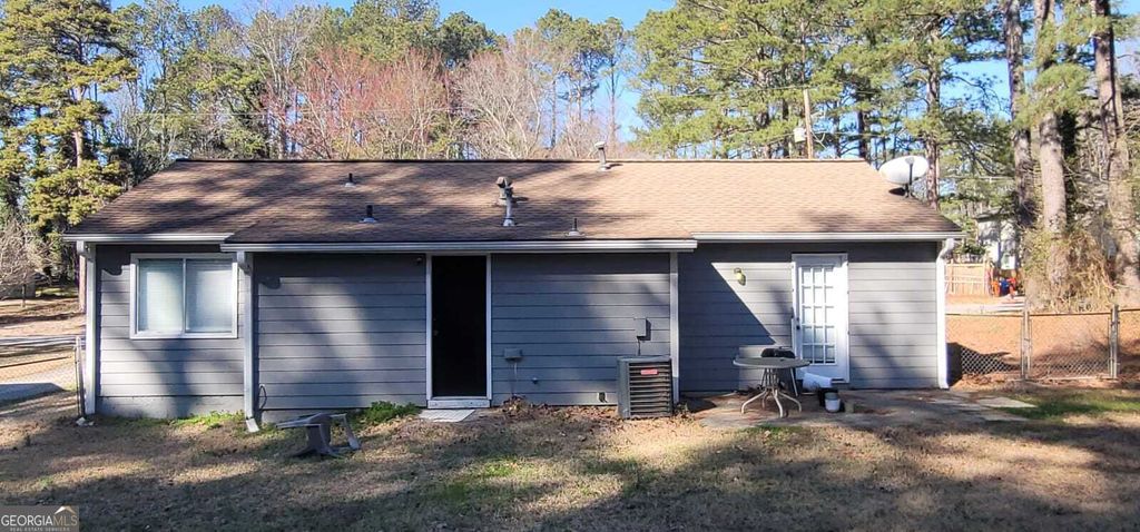Photo of 8975 Ashwood Drive, Riverdale, GA 30274 (MLS # 10689696)