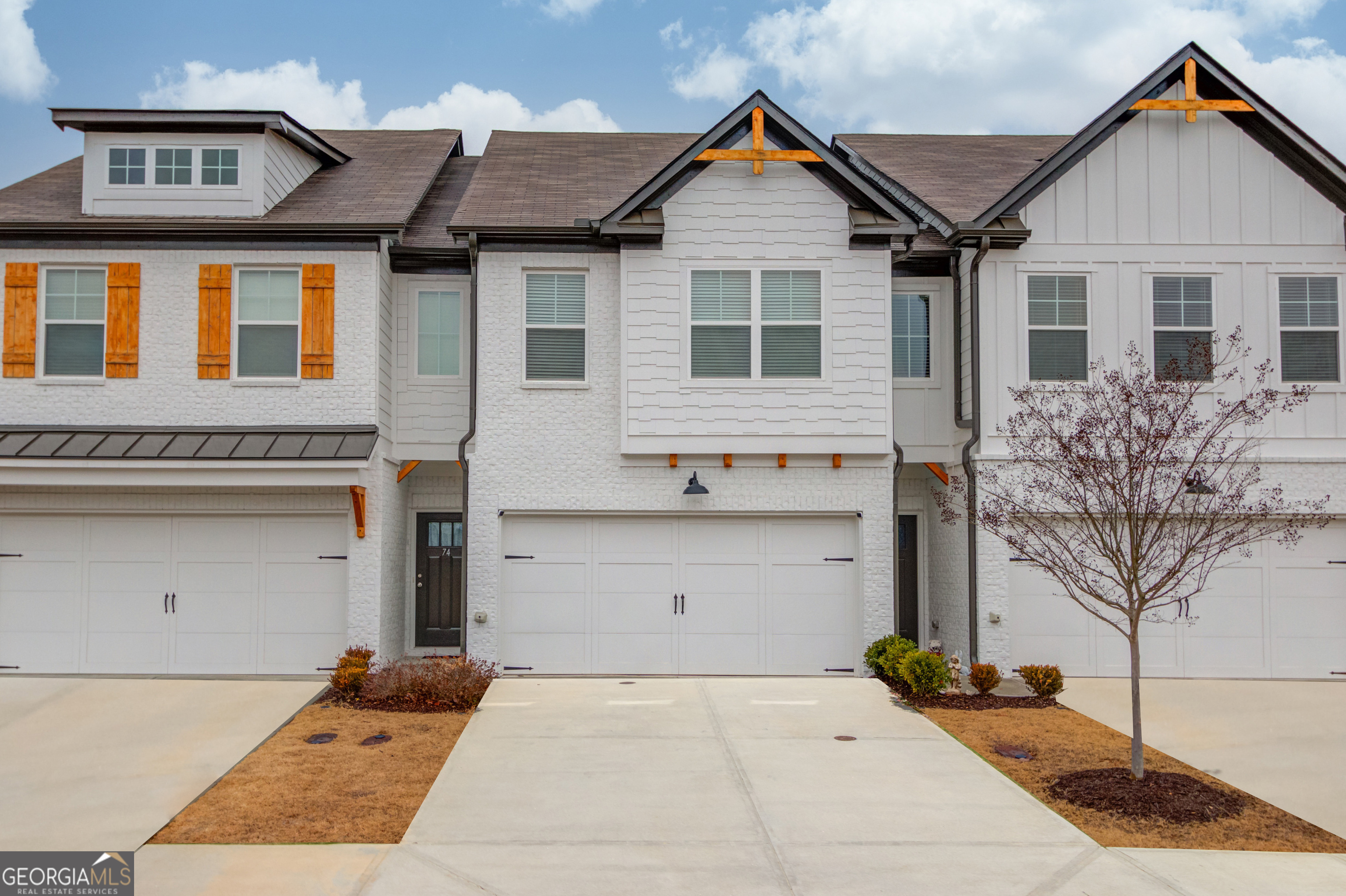 Fantastic Craftsman style townhome located just steps away from the neighborhood amenities! Open concept living at its finest with a bright, light atmosphere the interior of this home is practically brand new and hardwood flooring graces the entire main floor living area and stairs! The kitchen offers a large island with casual seating, stainless appliances, beautiful backsplash and a large pantry for storage. The dining area overlooks your fenced and peaceful backyard, while the adjacent family room is kept cozy by the fireplace. A convenient half-bath can also be found on the main floor. Upstairs the loft makes a great spot for your home office while the upstairs laundry keeps you from lugging the laundry downstairs! The Owner's suite is oversized and offers a sitting area and gorgeous ensuite bathroom with double vanity, spacious shower and relaxing soaking tub. The additional two bedrooms are amply sized and share a great secondary bathroom. The two-garage garage offers tons of storage options, while the fenced backyard is a great spot for your pets to play and enjoy the warmer months while BBQing on your back patio. Cannon Trace offers a clubhouse, pool and playground, sidwalks and is minutes away from all area amenities!