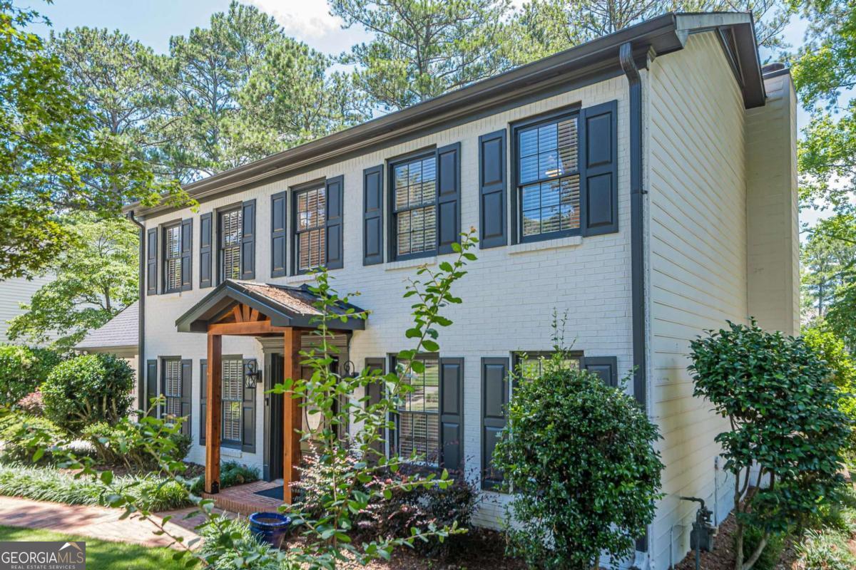 This beautifully renovated 4-bedroom, 2.5-bathroom home is a true gem, nestled in the Pope High School district. Set on a private lot, the property offers peaceful views of a serene private pond, perfect for those who appreciate nature's beauty. As you enter, you'll be greeted by an inviting foyer and the spacious living areas with recessed lighting, a formal dining room, and a convenient half bath and office and large great room. The fully updated kitchen is open to the breakfast area and great room and has direct views of the pond and expansive outdoor decks. Off the kitchen enjoy the storage and convenience of a Butler's Pantry providing ample storage, along with an ice maker and an adjacent wine fridge, making it perfect for hosting gatherings. Upstairs, the oversized primary suite with double closets offers comfort and luxury as well as an updated primary bathroom . A dedicated laundry room is conveniently located just off the primary bedroom. The primary suite also features a flex area with private stair access to the main level, this space is ideal for use as an additional office or private retreat. Throughout the home, you'll find luxurious updated LVT flooring, fresh paint, and updated hardware and lighting. With all appliances included, all this property is missing is YOU. The outdoor spaces are equally impressive, with multiple decks, a charming gazebo, and a screened-in porch, providing perfect spots for relaxation and entertaining. Just steps away, the community offers optional swim and tennis facilities, enhancing the lifestyle appeal should you choose to join the community HOA. Don't miss out on this exceptional opportunity to live in a beautifully rennovated home with unmatched amenities and a prime location. Your new home awaits!