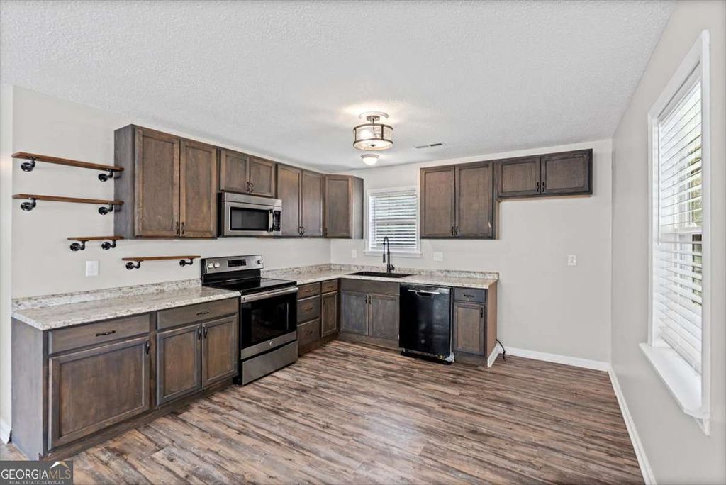 Photo of 648 Johnson Road SE, Adairsville, GA 30103 (MLS # 10703107)