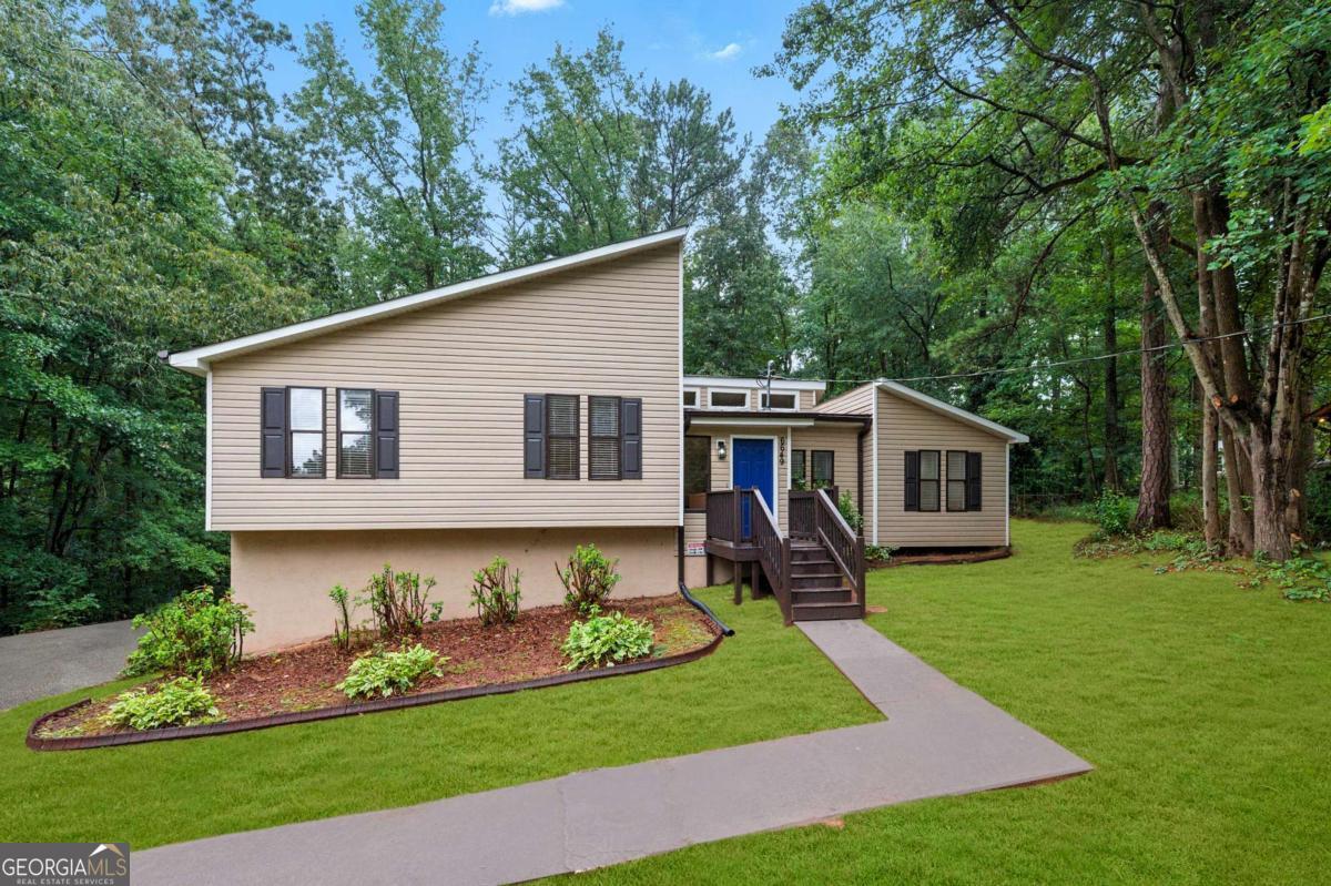 Rare Renovated Split Level with In Law Suite. No HOA and No City Taxes. Finished Basement. One of the best values in the new City of Mableton. This fully renovated split level home is move in ready, fits your lifestyle, and delivers unbeatable affordability. Get qualified for rates as low as 4.99% and enjoy seller paid closing costs with the right offer. Ask for details. The location is unbeatable. Only 20 minutes to The Battery for Braves games, dining, and late night fun, 20 minutes to downtown Atlanta, and 25 minutes to Hartsfield Jackson Airport. Close to the Mableton Epi Center with aquatics, gym, co working space, and event facilities. Surrounded by new shops, restaurants, parks, the Silver Comet Trail, and everyday conveniences. Inside you will find an open floor plan with soaring ceilings, bamboo floors, fresh designer paint, a brand new kitchen, and fully updated baths. The spacious owner's suite features a modern spa like bathroom. The finished basement includes a private in law suite with its own kitchen, living room, bedroom, bath, and separate entrance. Perfect for rental income, multigenerational living, or a home business. Enjoy outdoor living on your private rear deck, a large yard that is easy to maintain, a roomy storage shed, and parking for more than five cars. With no HOA, no city property taxes, and a prime location in a fast growing community, this home is a rare find. Tour it this weekend before it is gone. FHA, Cash, Conventional and VA financing available.