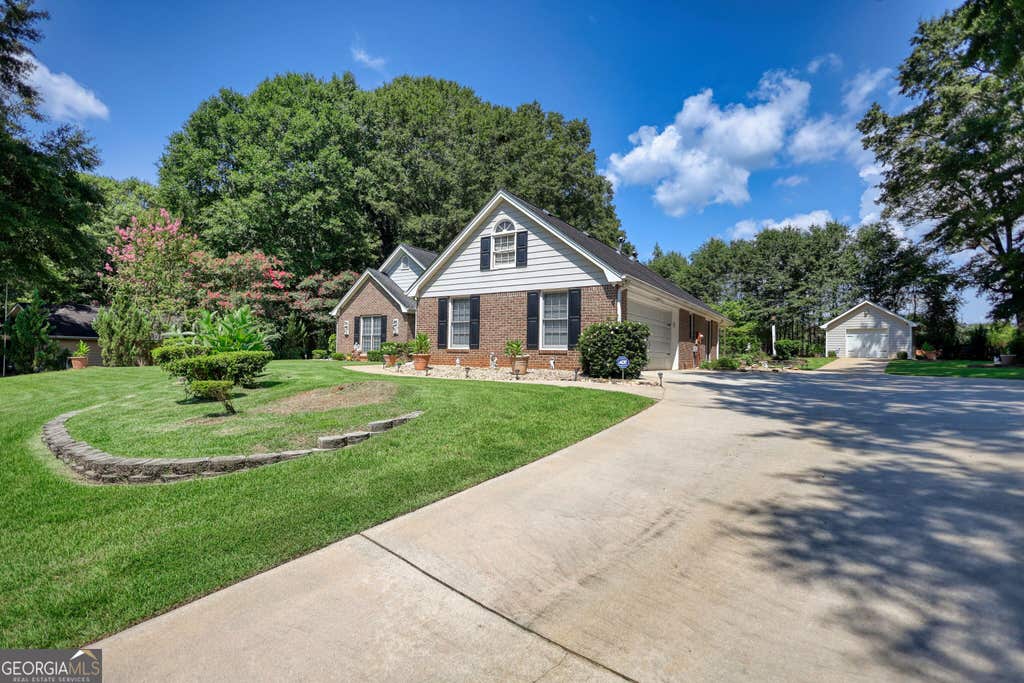 Photo of 115 Buck Creek Drive, Covington, GA 30016 (MLS # 10828214)