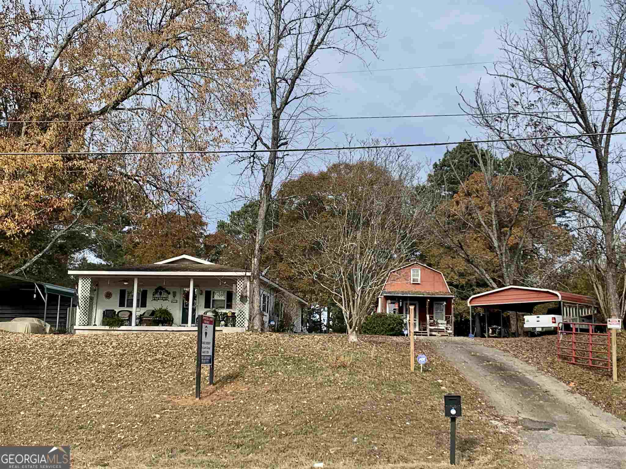 1.5 acres of POTENTIAL commercial land and 1098 square foot house (currently used as residential) that could be used as an office or other use. Also included is a one bedroom, one bathroom barn apartment & 3 additional storage buildings. 150 ft of road frontage in high traffic volume area on Hwy 81 in Newton County. Possible adjoining commercial acreage. NO LOCKBOX, APPT ONLY!! - Call agent for more information.