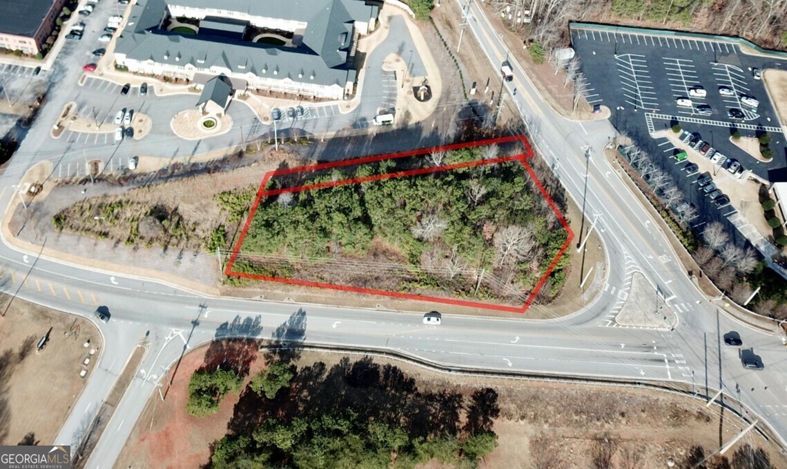 The property is located at the northwest corner of Timber Ridge Drive and Prestley Mill Road. The intersection provides a four way traffic signal with turning lanes. Located at the intersection is Brighton Academy, West Georgia Technical College, a medical office building, First Baptist Church of Douglasville, Benton House Assisted Living and The Oaks Assisted Living. Approximately 373' of road frontage on Timber Ridge Drive and approximately 123' of frontage on Prestley Mill Road. The traffic count averages 1,435 vehicles per day on Timber Ridge Road and 2,317 vehicles on Prestley Mill Road. The topography offers level contours with a light timber stand. Currently zoned PUD and Public-Semi Public in the City of Douglasville. The Seller will entertain a rezoning of the Property.