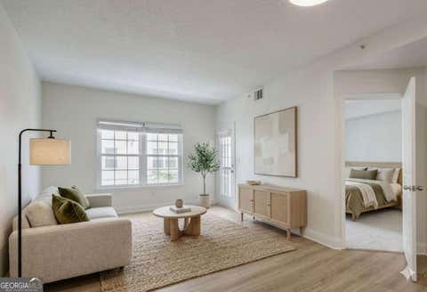 Photo of 1075 Peachtree Walk NE #A301, Atlanta, GA 30309 (MLS # 10800688)