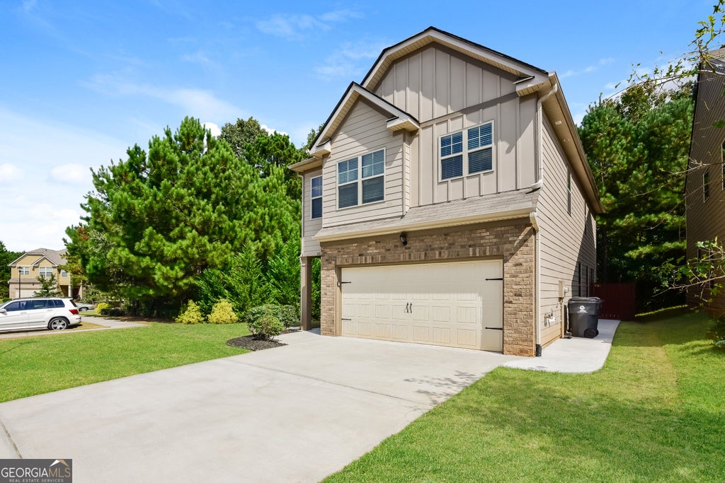 Photo of 5097 Rapahoe Trail, Atlanta, GA 30349 (MLS # 10867134)