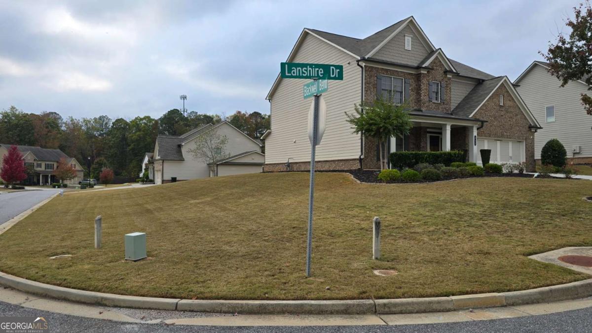 Beautiful house with lots of upgrades, huge 0.4 acre corner lot, hardwood floors in the entire house, top Forsyth schools, Denmark High school, big kitchen Island, Close to GA 400, Collection mall and all the shopping, East facing, all the bedrooms have attached bathroom