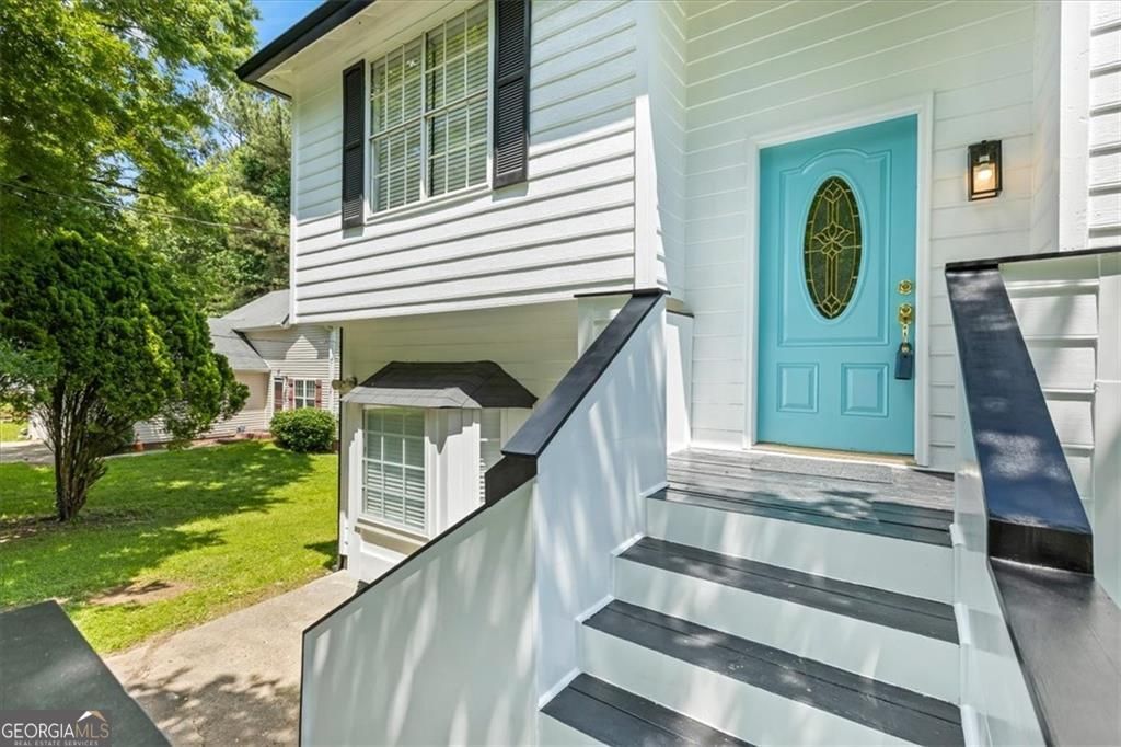 Photo of 5250 Forest Downs Lane, Atlanta, GA 30349 (MLS # 10701789)